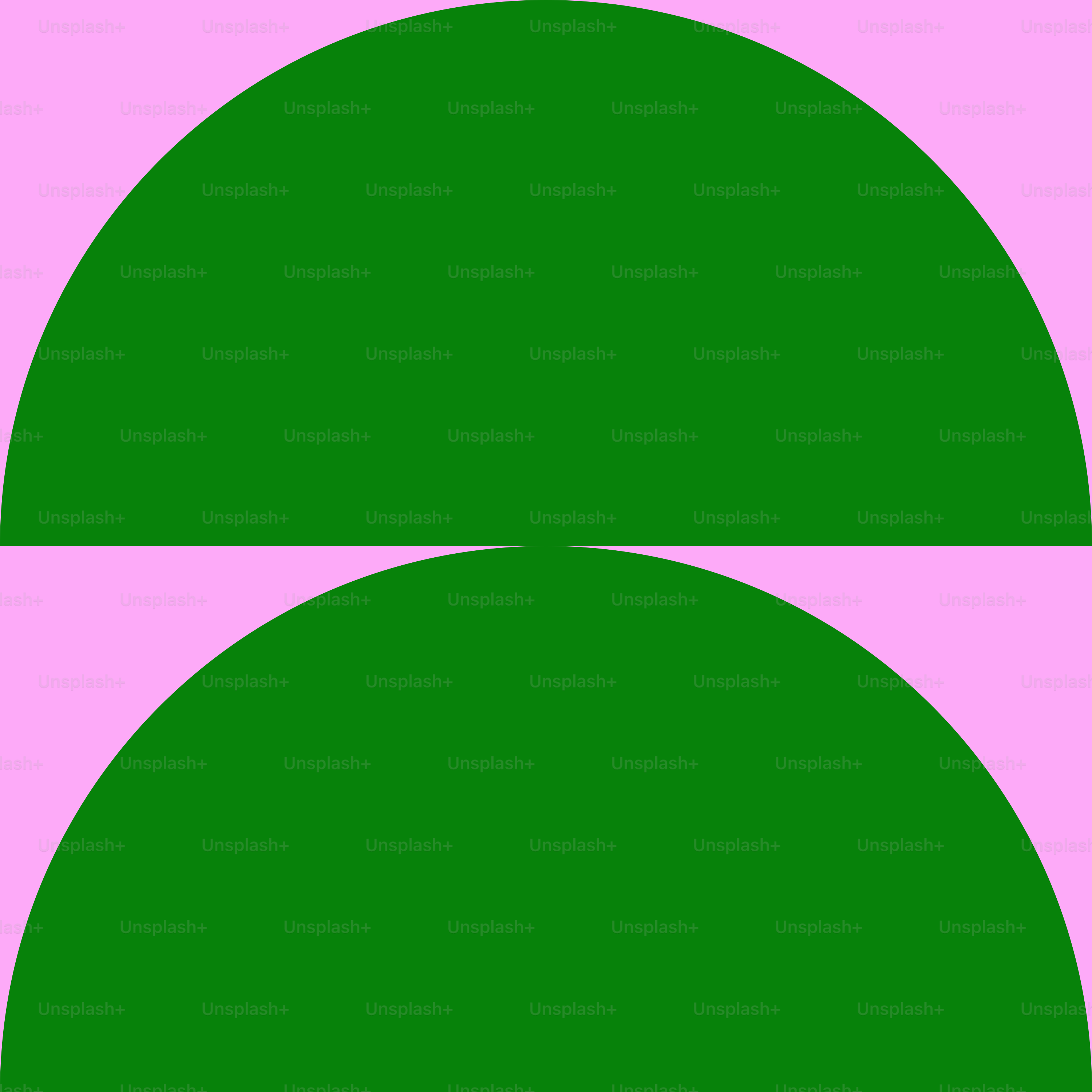 Two green circles on a pink background
