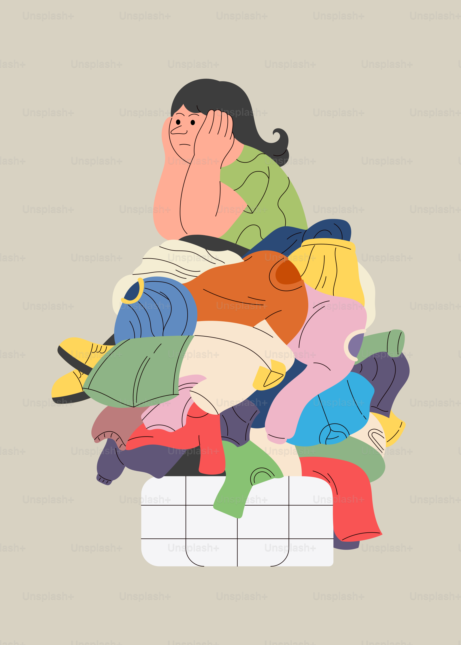 A woman sitting on top of a pile of clothes