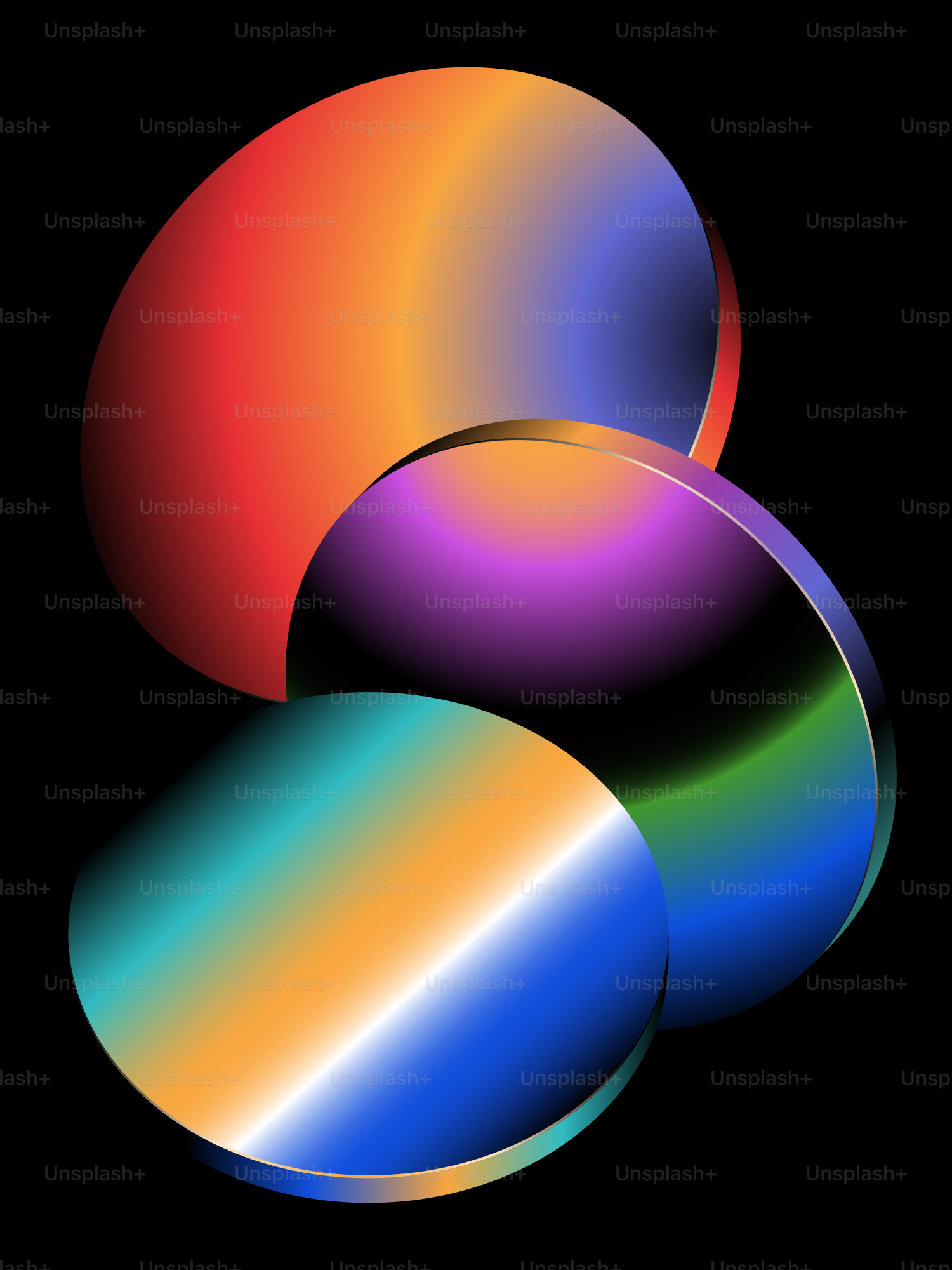 A black background with three different colored circles