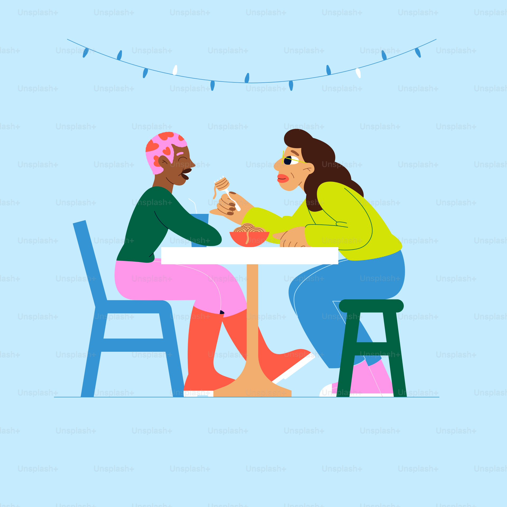 A couple of people sitting at a table