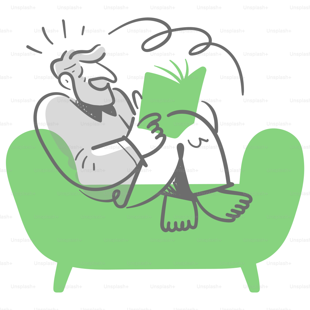 A man sitting on a couch reading a book