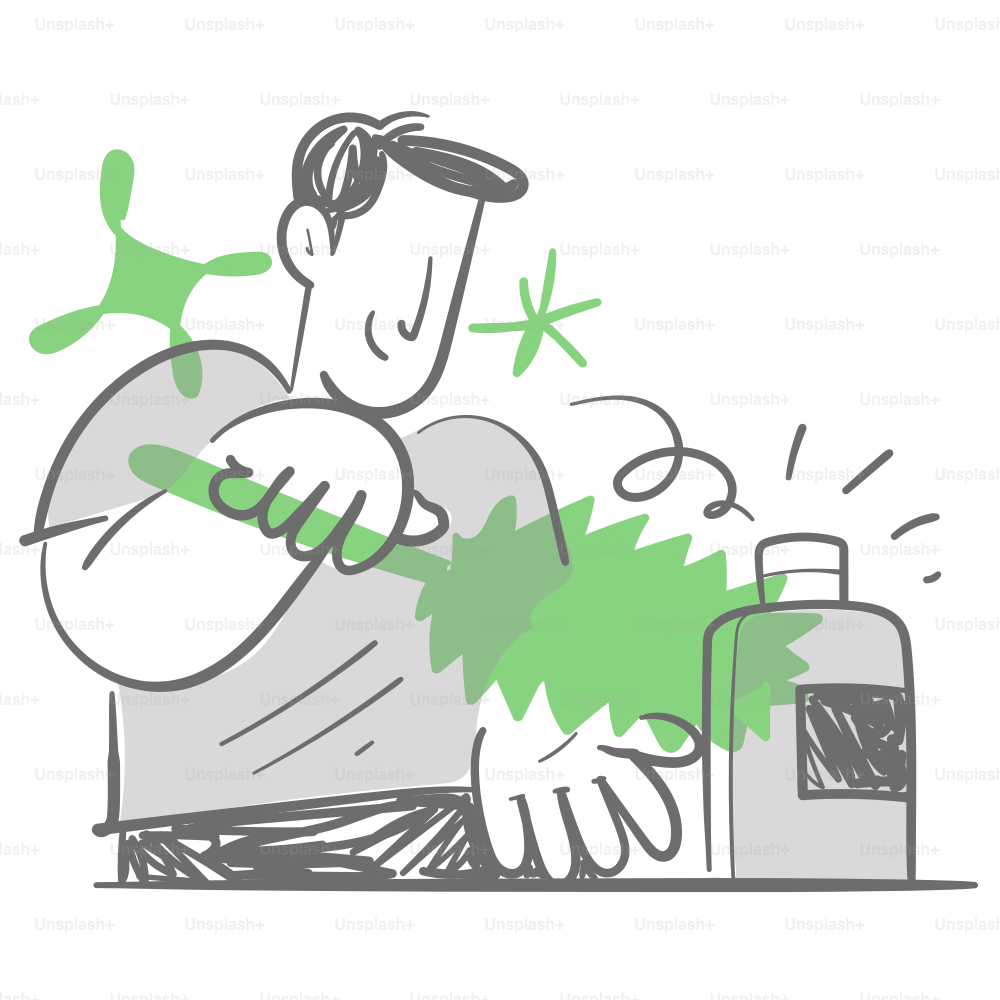 A man sitting at a table with a bottle of alcohol