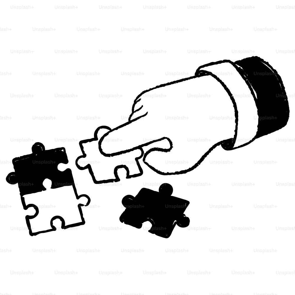 A hand holding a piece of a puzzle