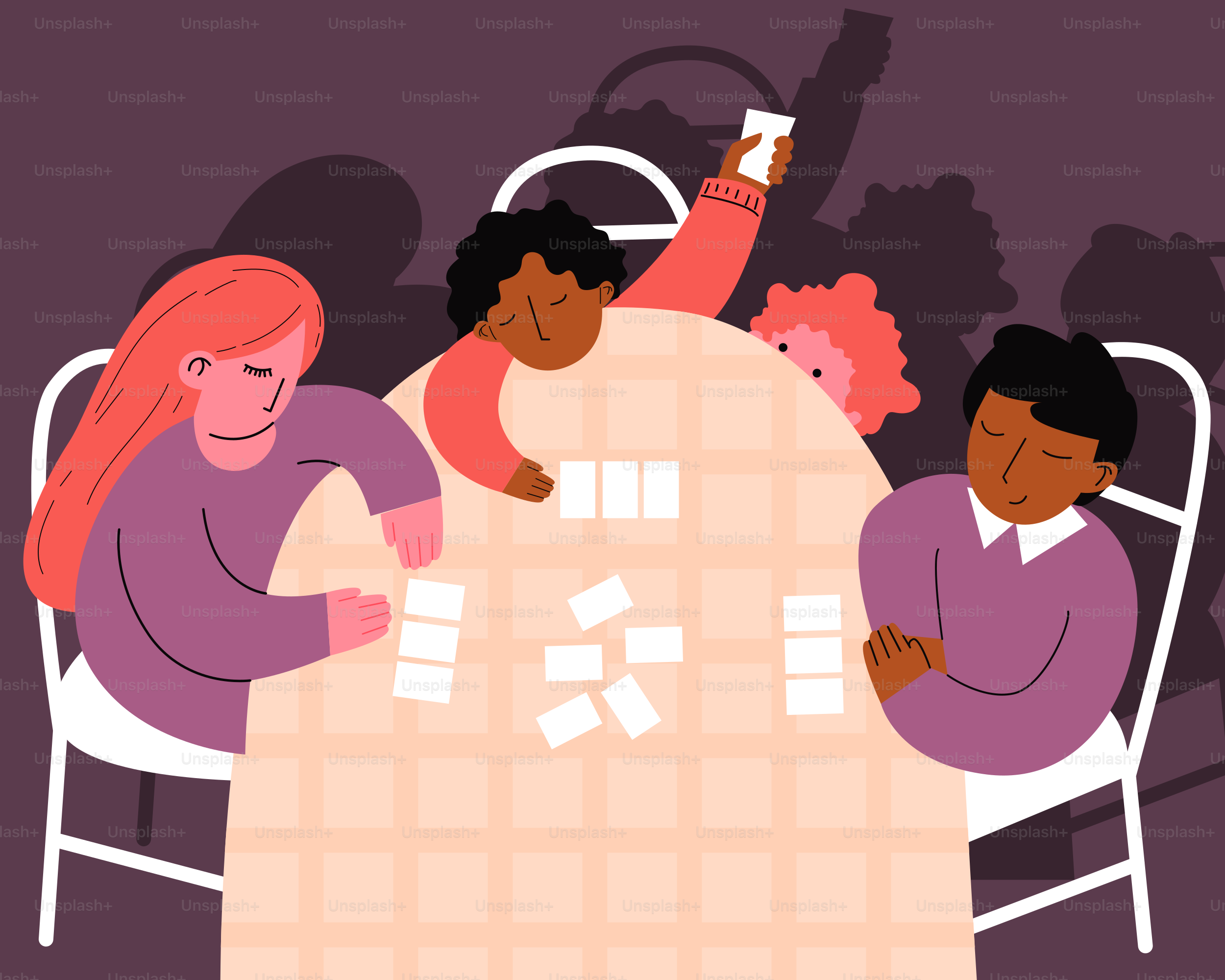 Eine Gruppe von Menschen, die um einen Tisch sitzen