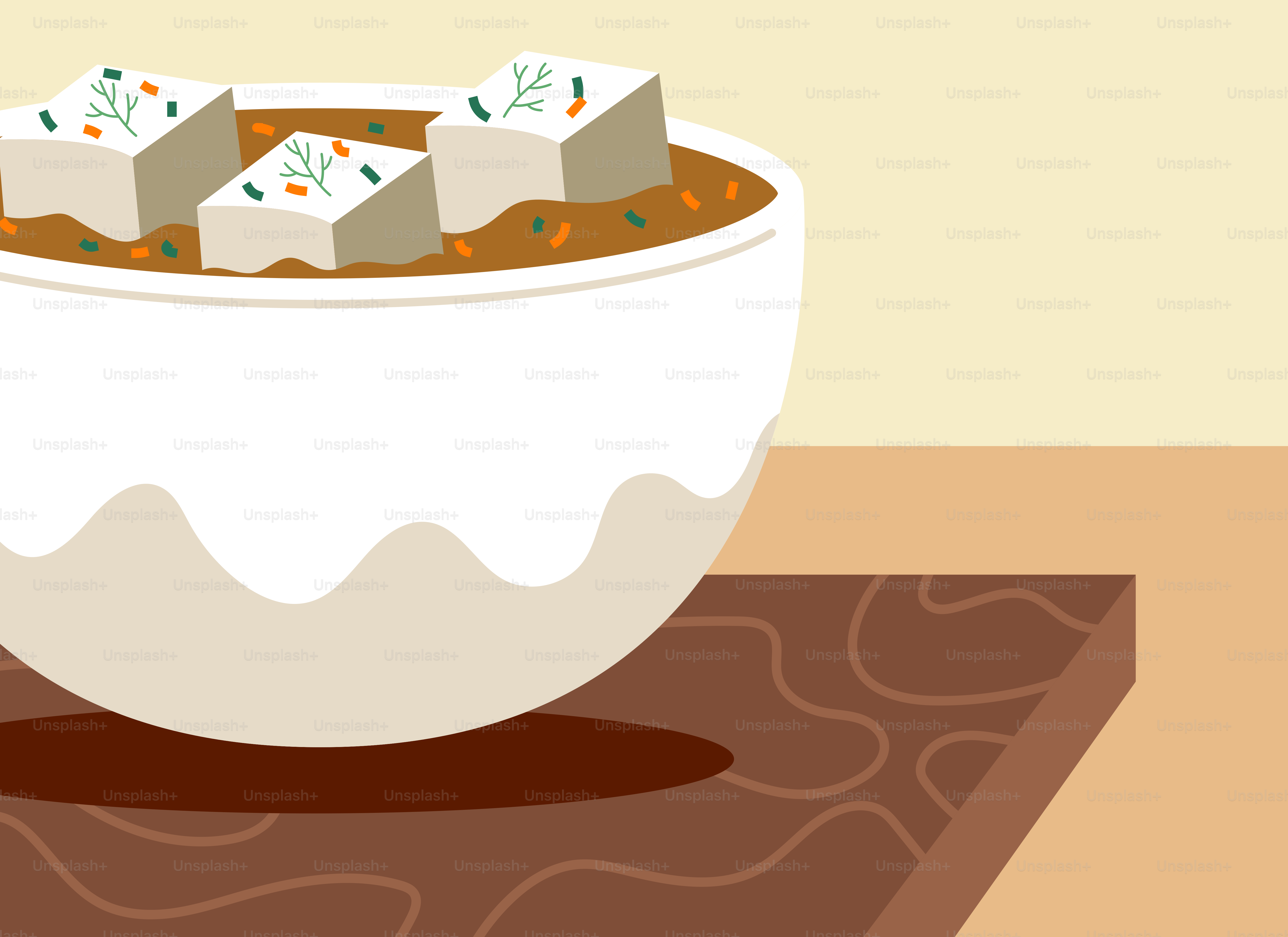 A bowl of soup with tofu and carrots in it