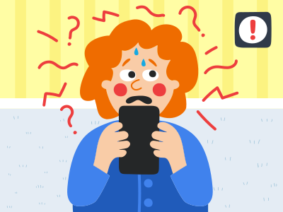 한 여성이 휴대폰을 보고 있다