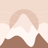 A brown and white mountain with a sky background
