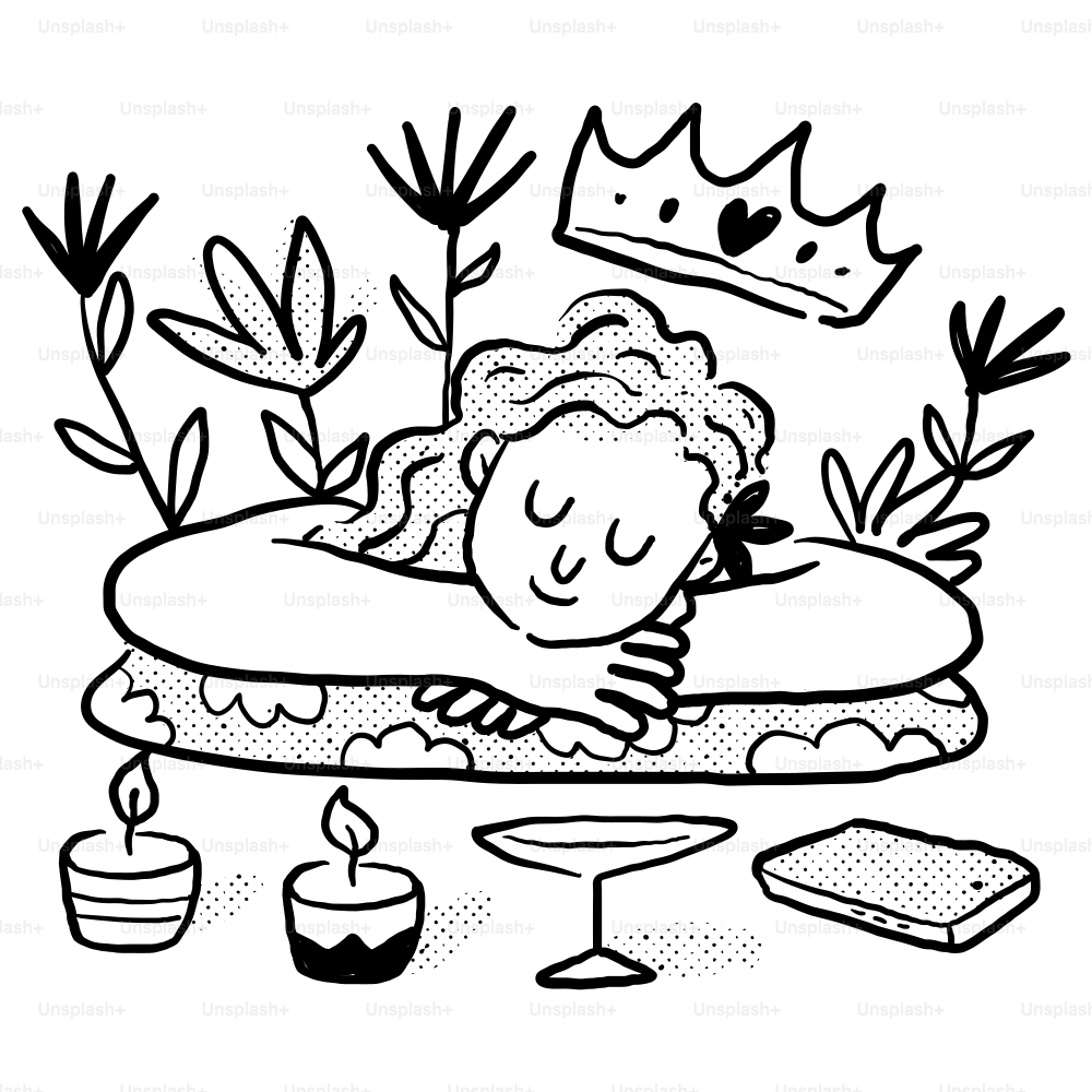 A person laying on a pillow with a crown on top of it