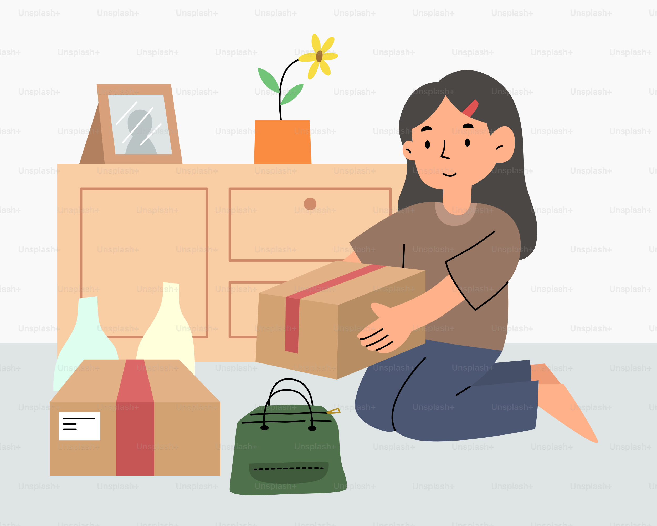 A woman is sitting on the floor with a box