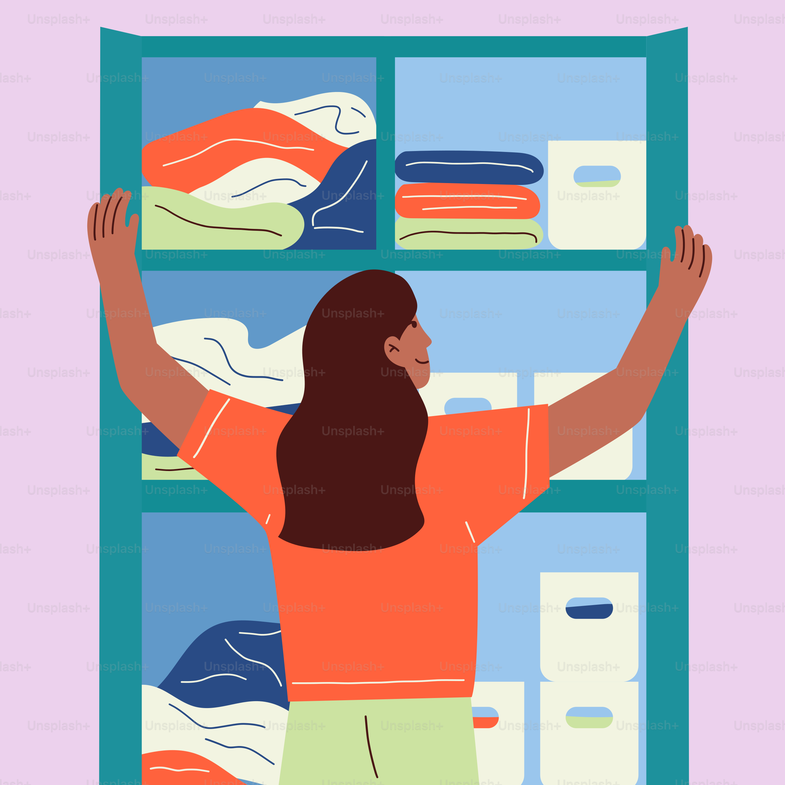 A woman standing in front of a closet filled with clothes