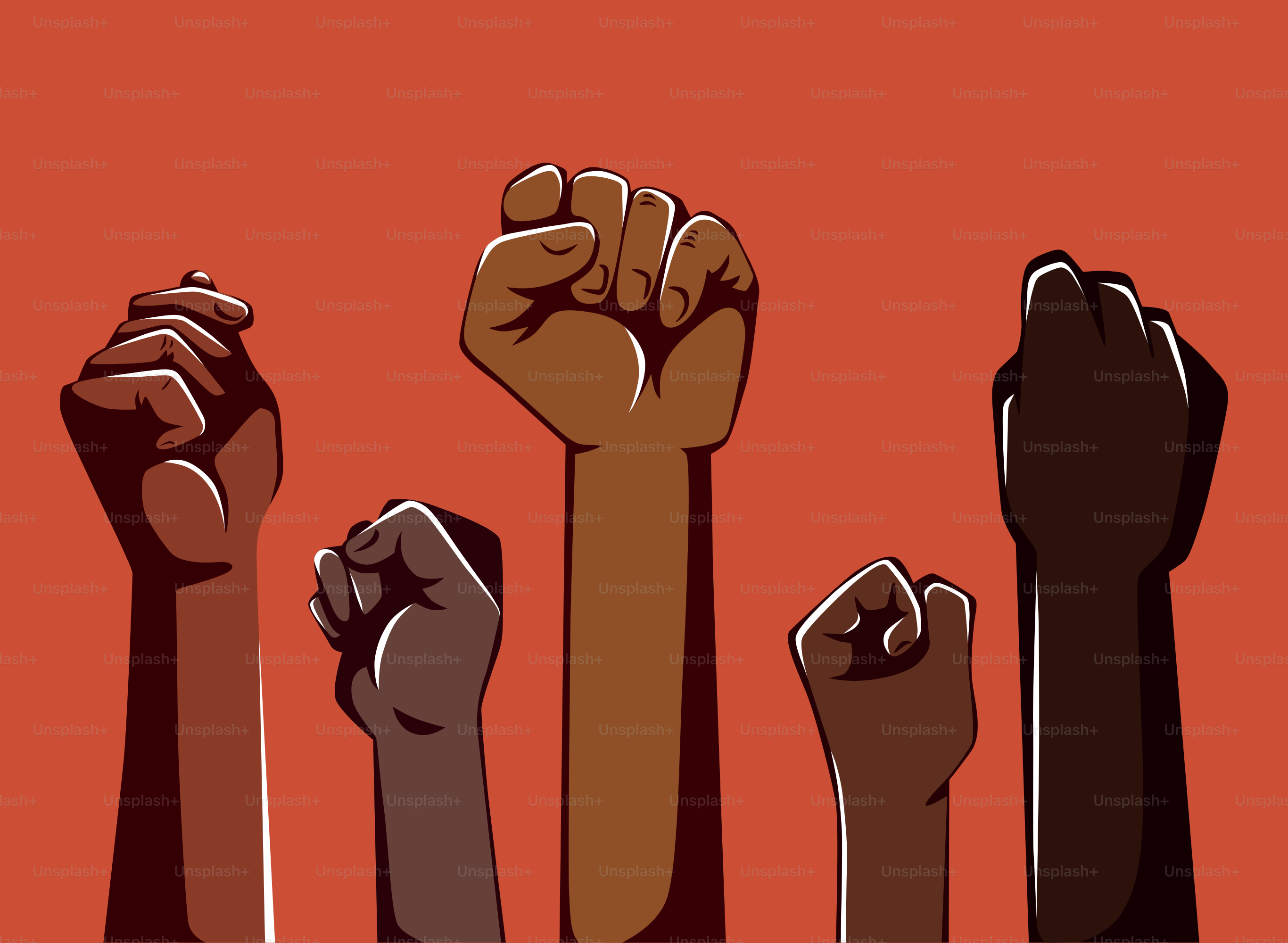 A group of people raising their hands in the air