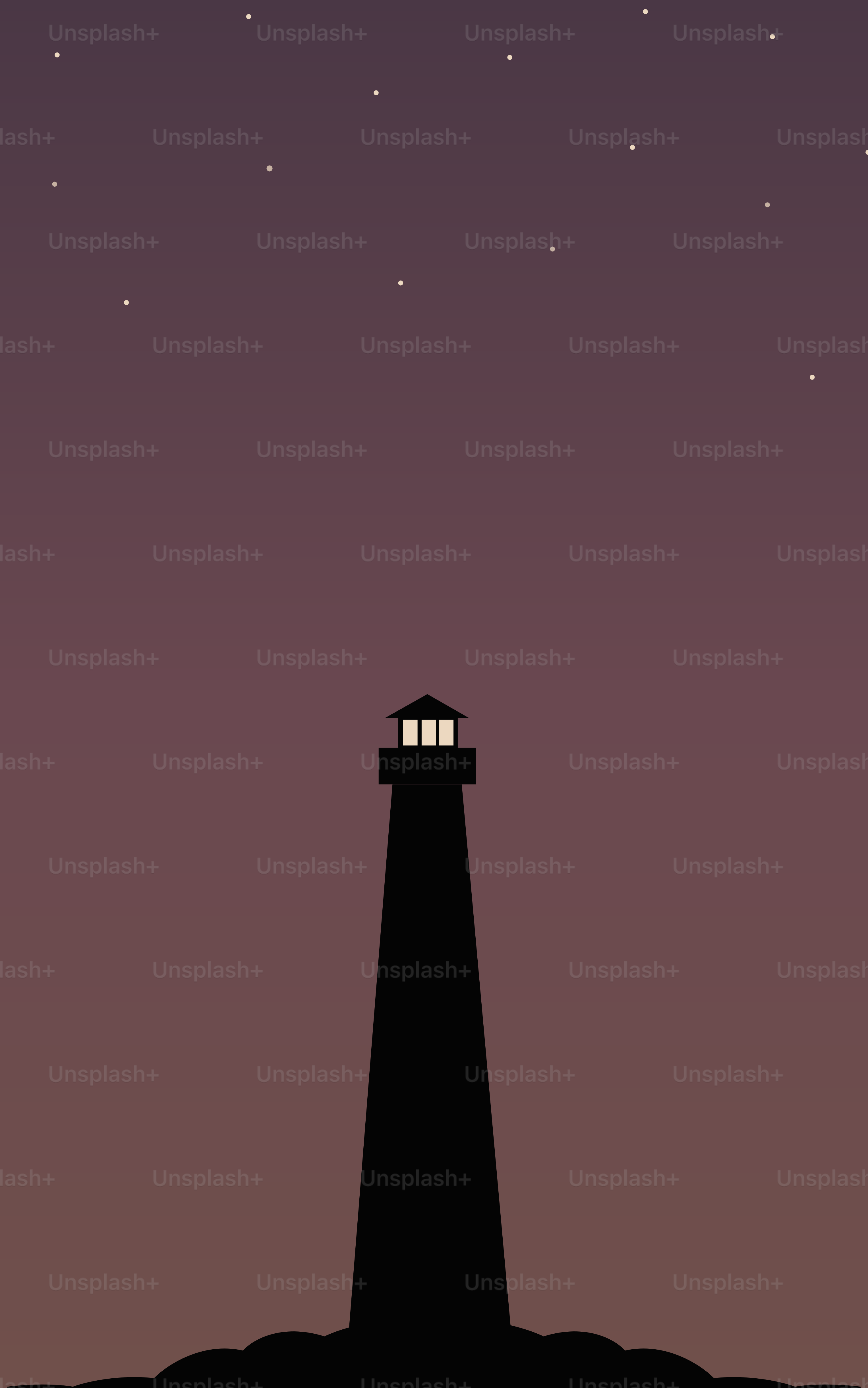 A lighthouse on top of a hill at night