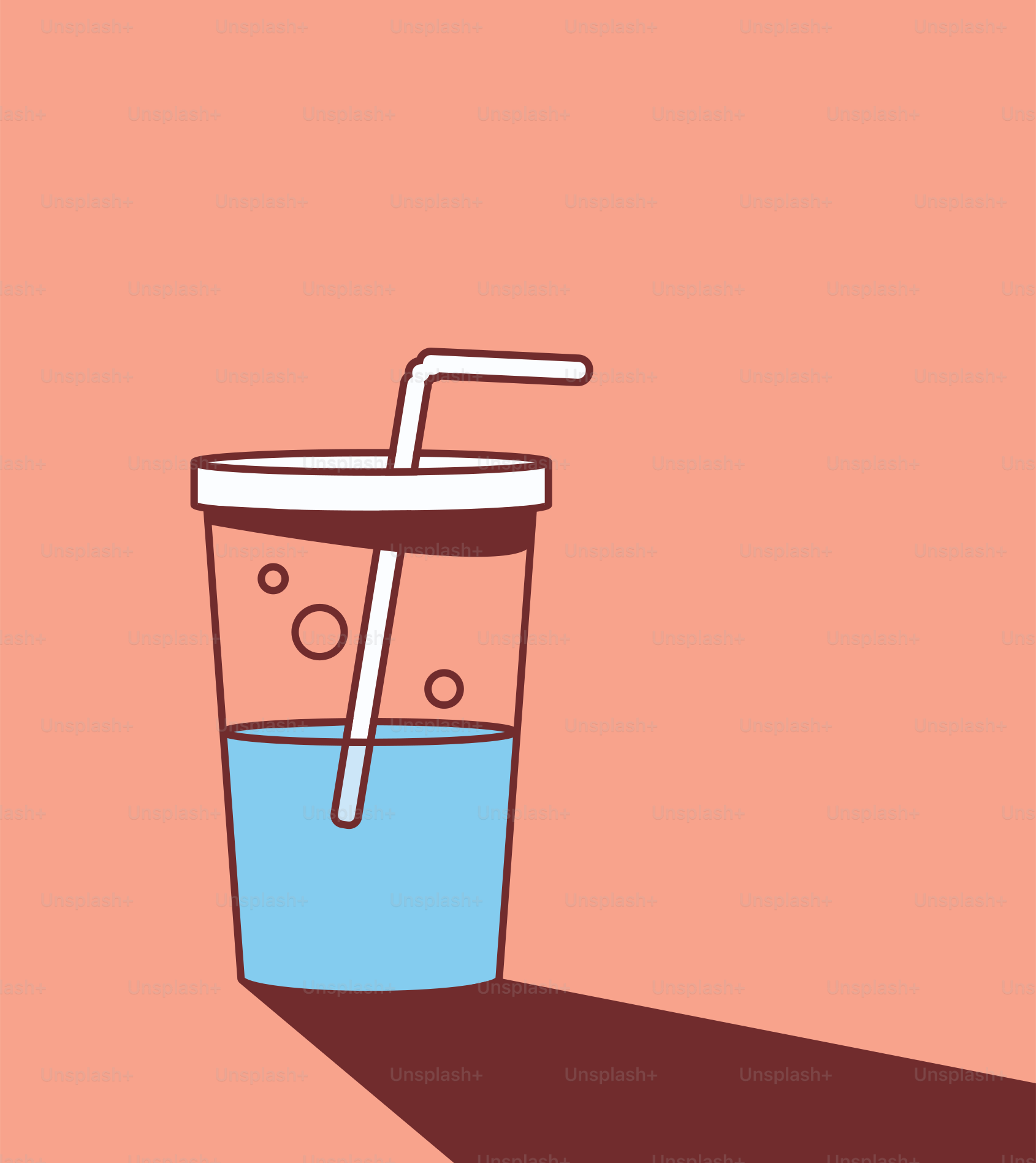 A glass of water with a straw in it