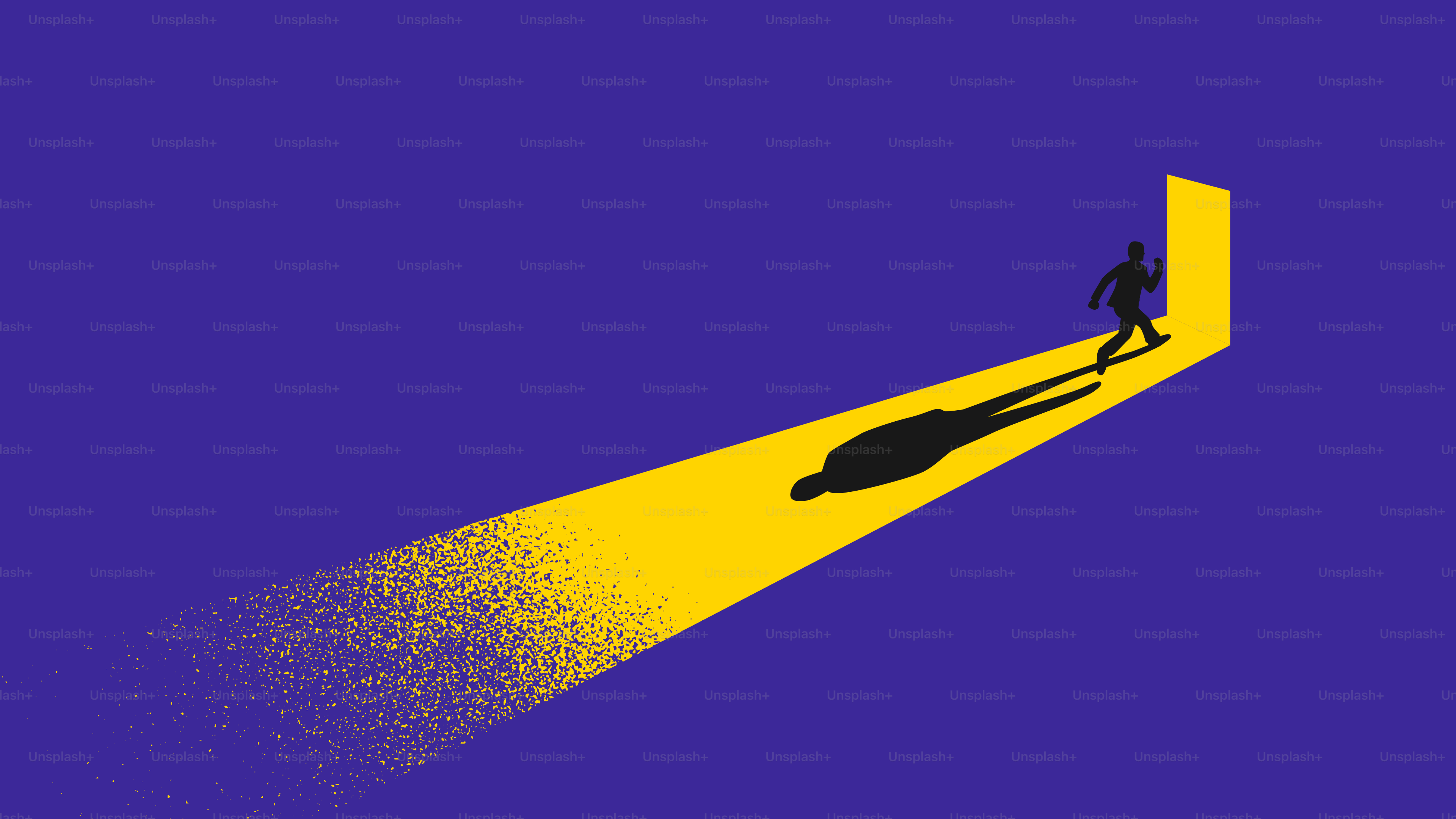 A man is walking towards a light at the end of a tunnel