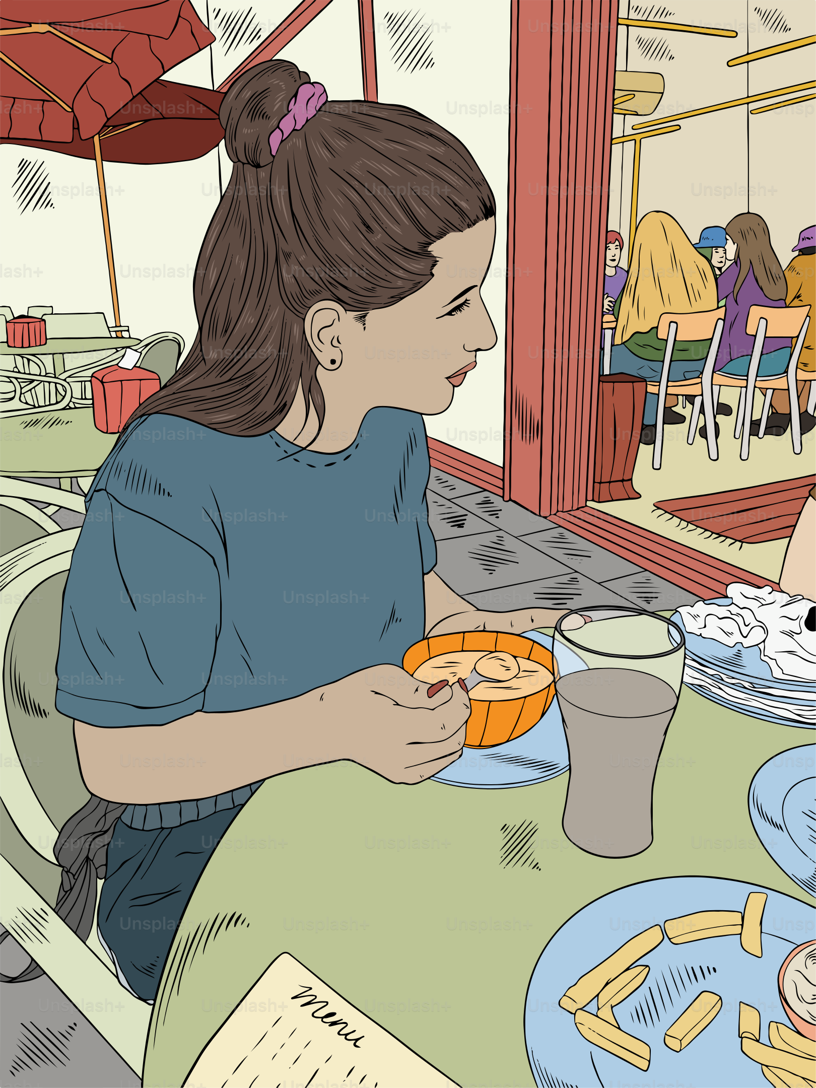 A woman sitting at a table with a plate of food