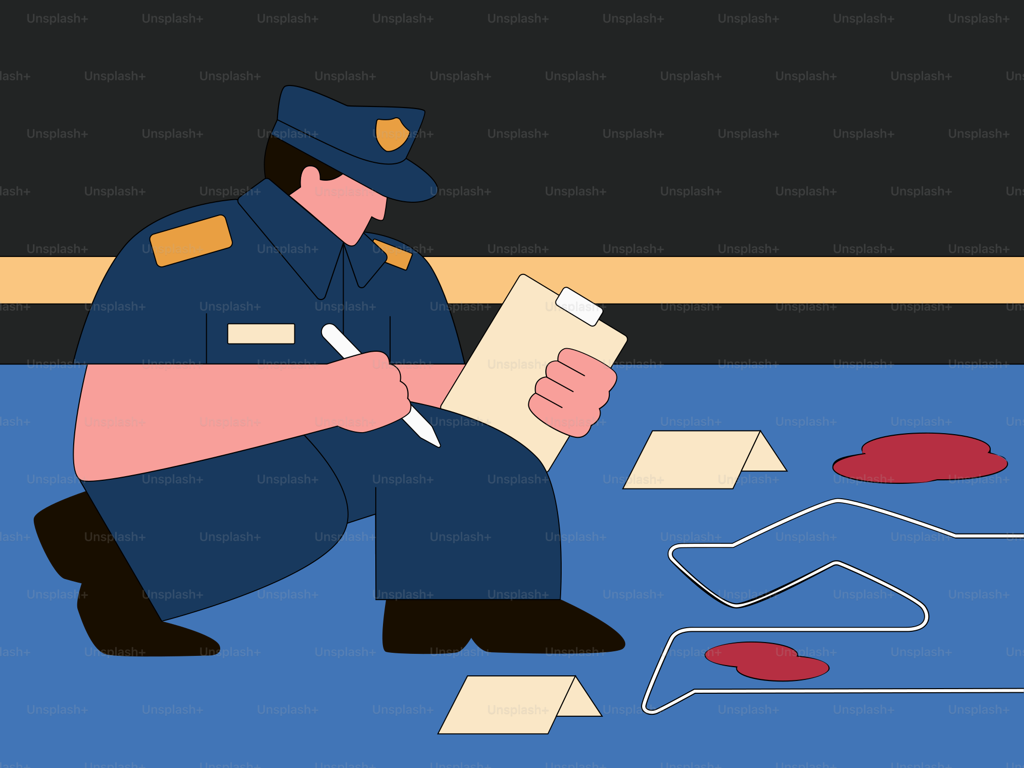 Un policier assis par terre en train d’écrire sur un bout de papier