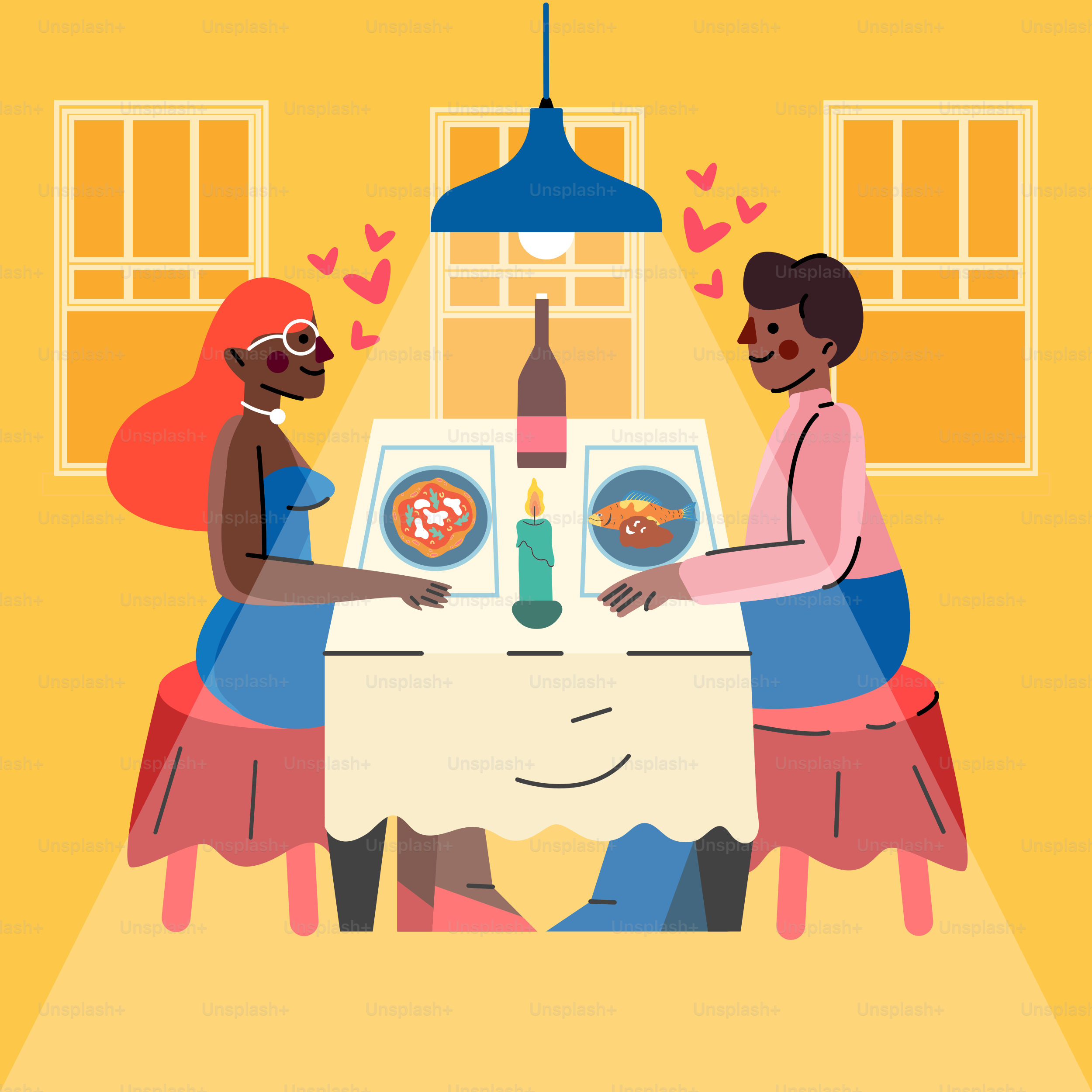 A couple of people sitting at a table