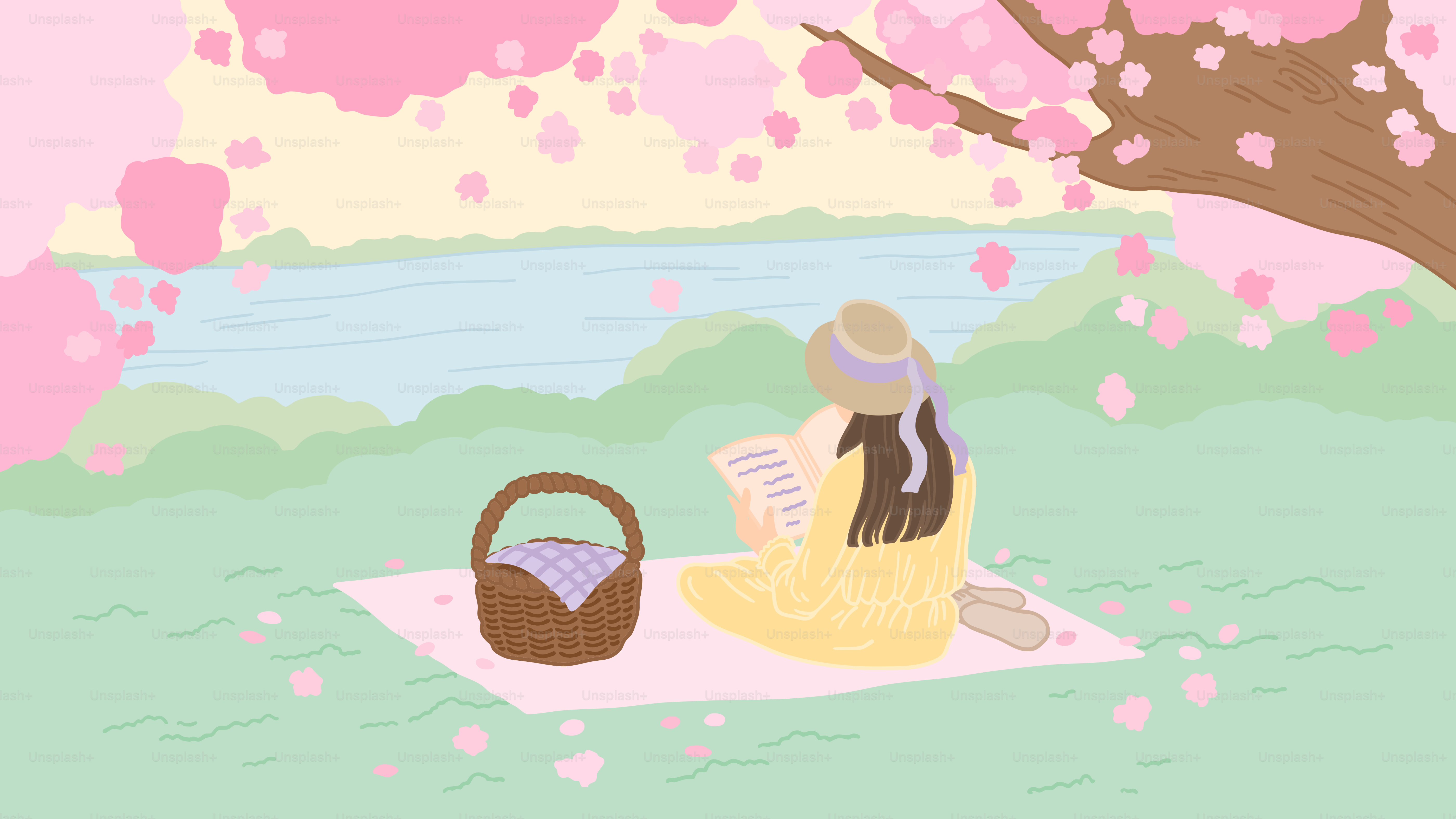 A woman sitting under a tree reading a book