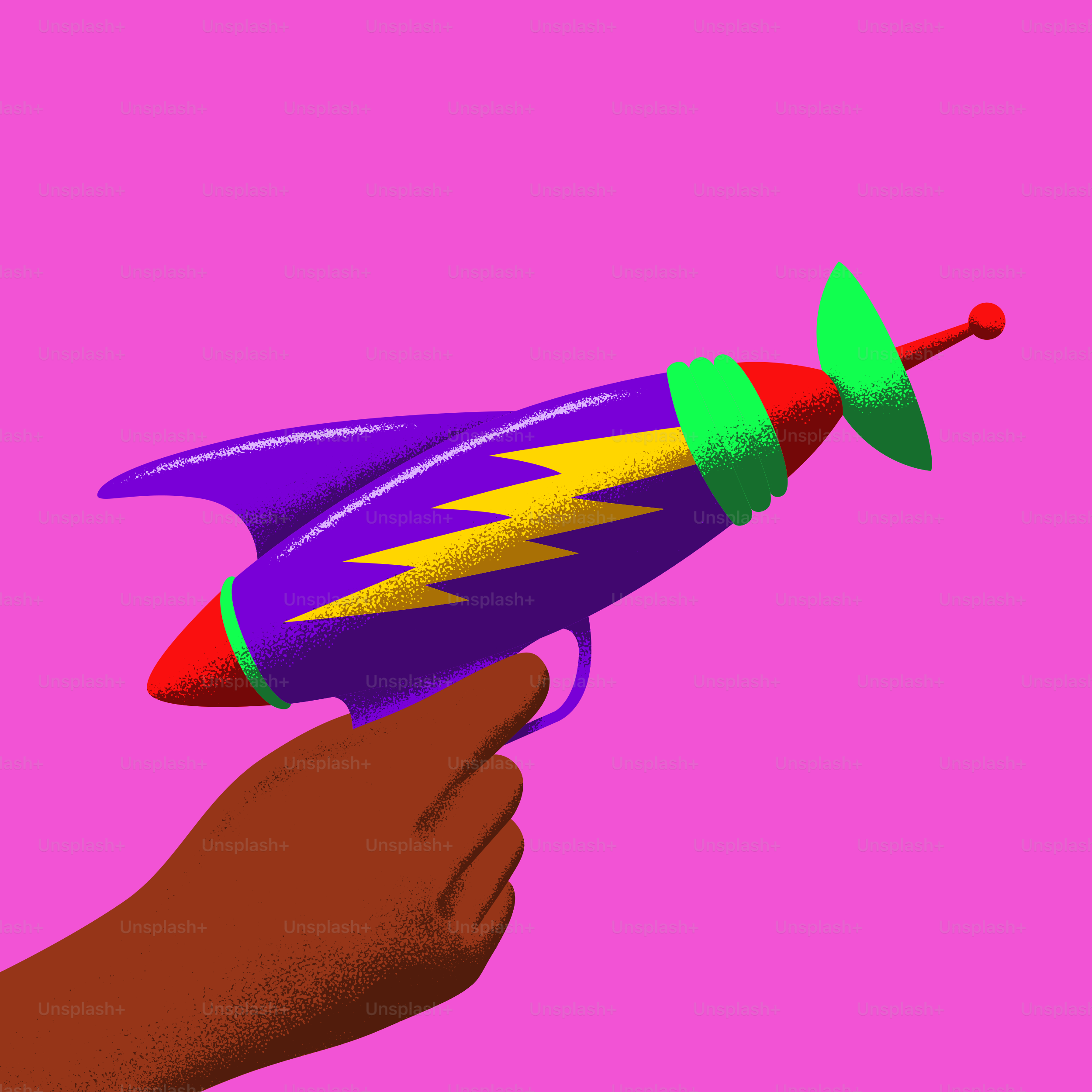 A hand is holding a toy that looks like a rocket ship