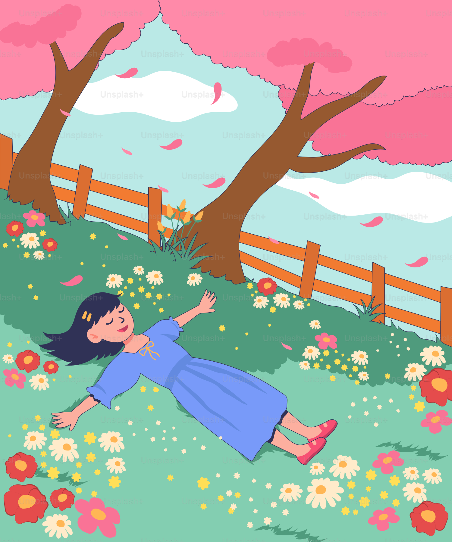 A little girl that is laying down in the grass