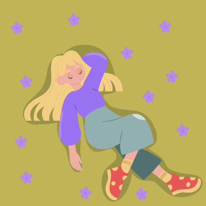 A girl laying on the ground with her eyes closed