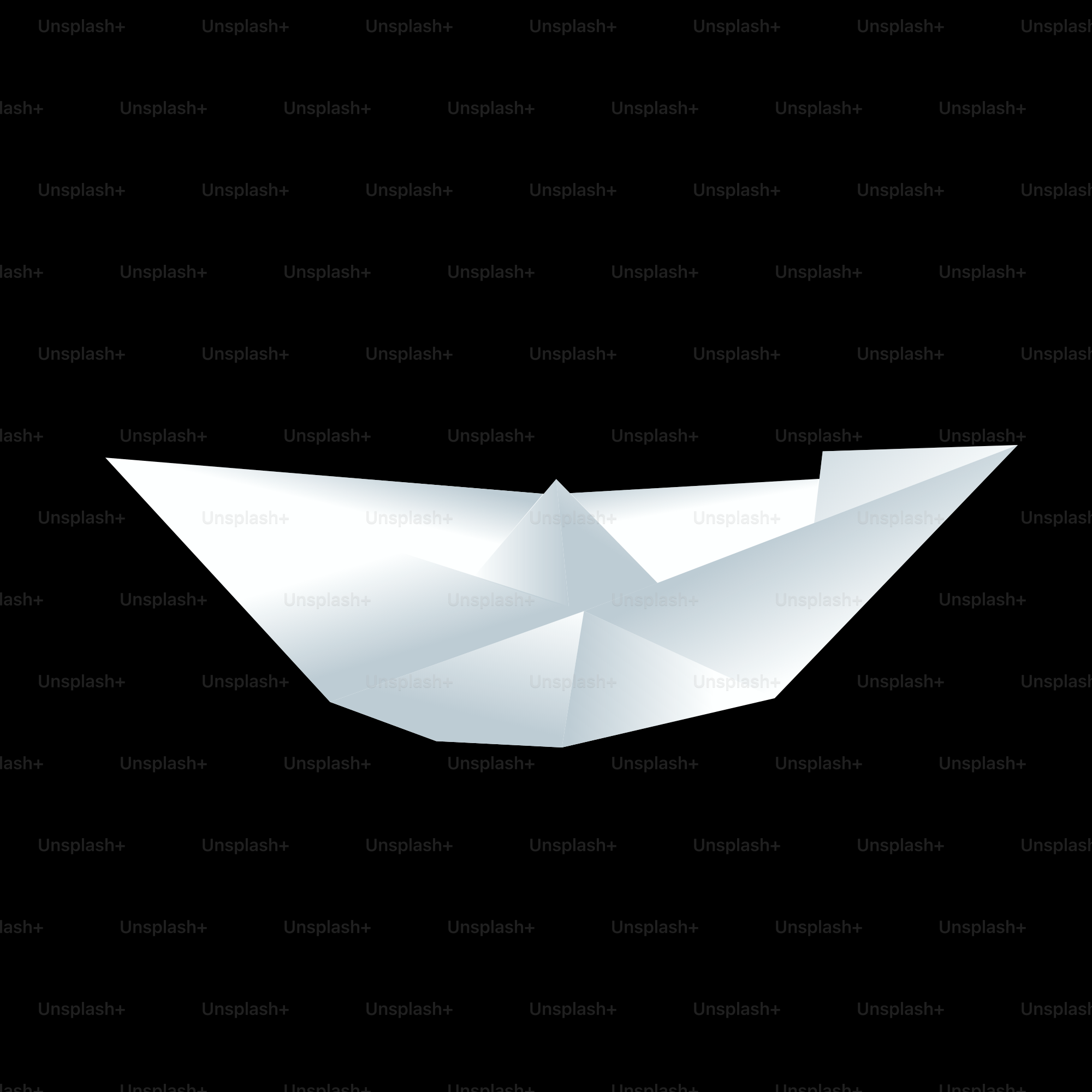 A white paper boat floating on top of a black surface
