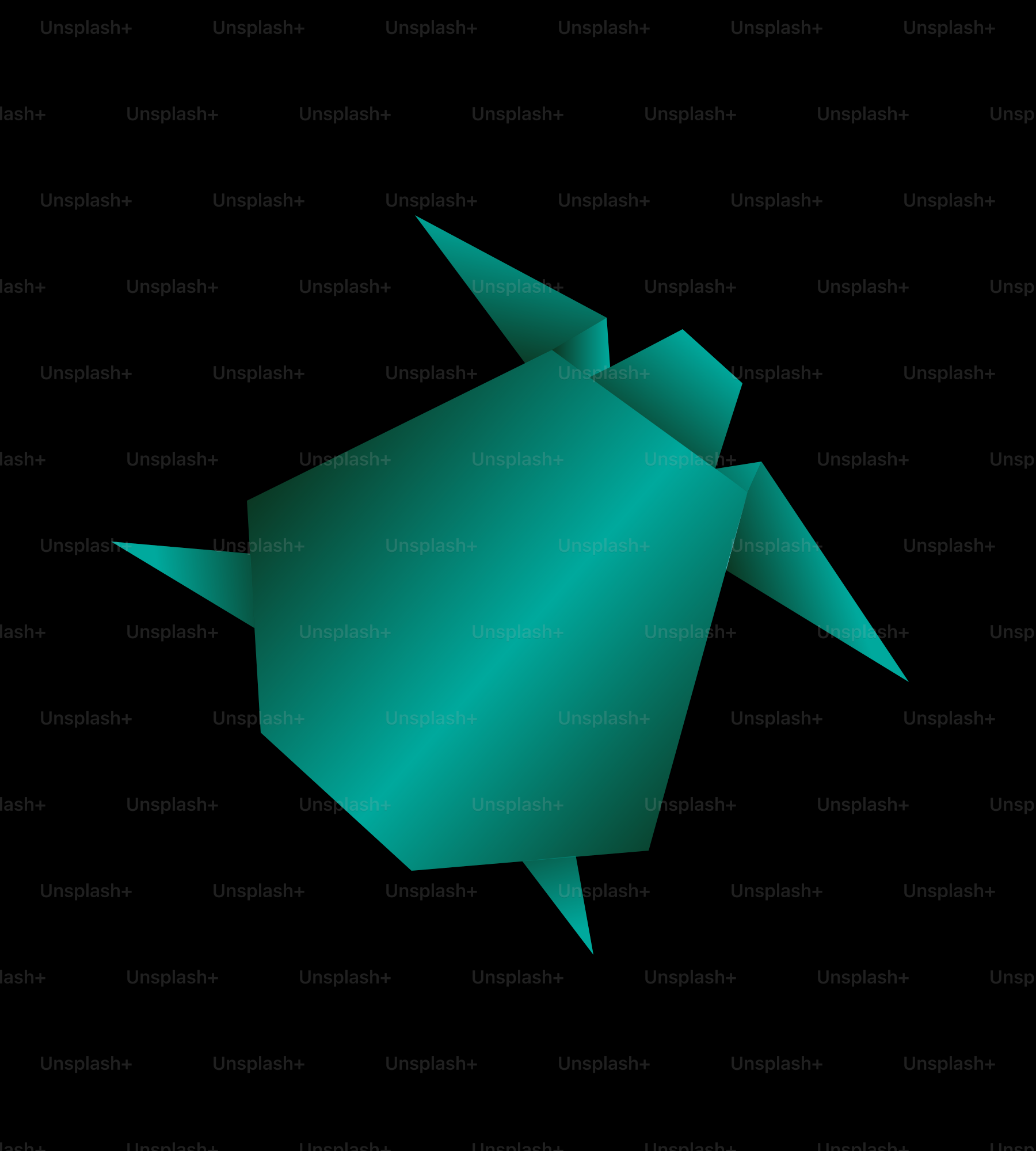 A green origami fish on a black background