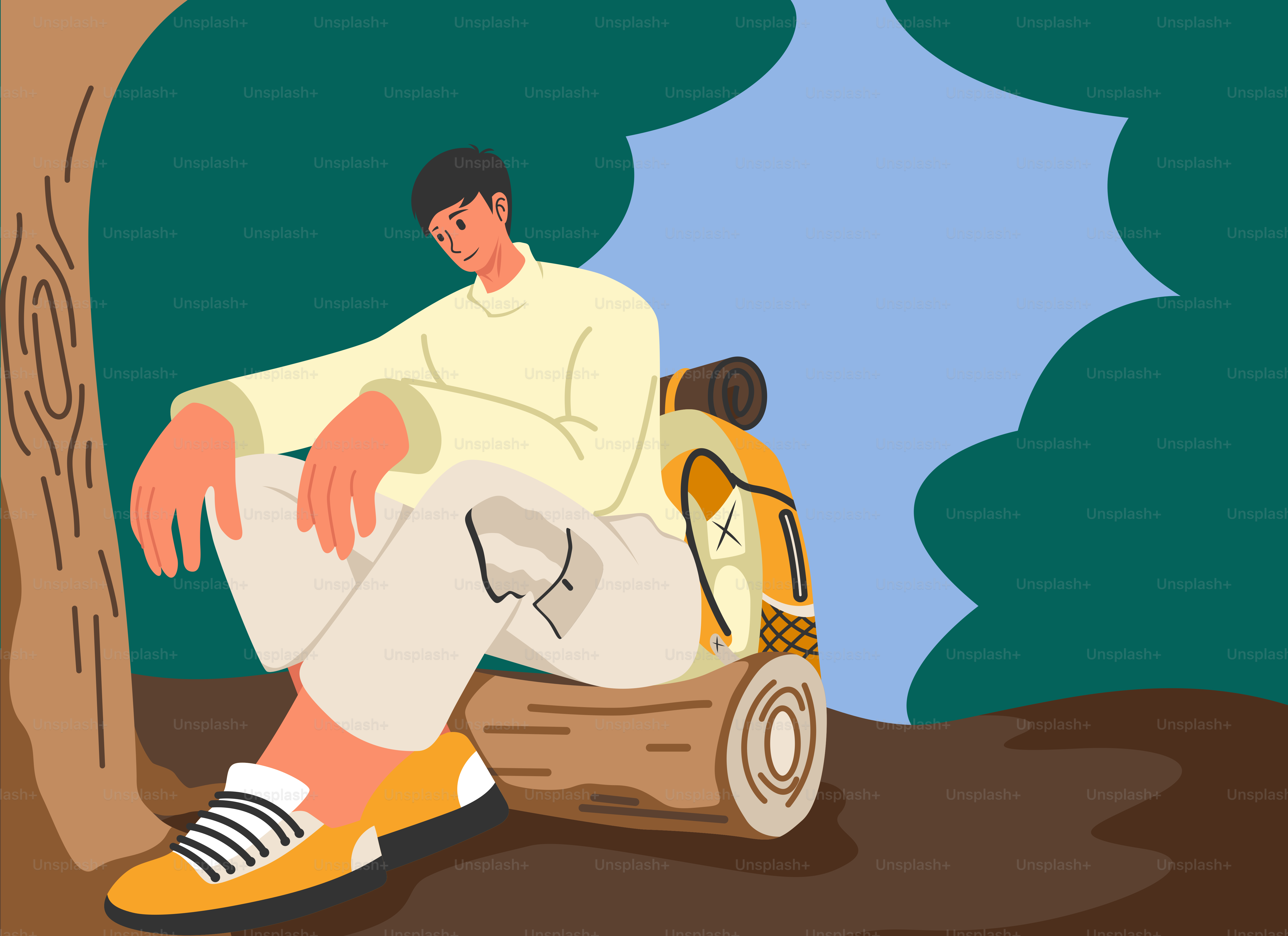 A man sitting on a log in the woods