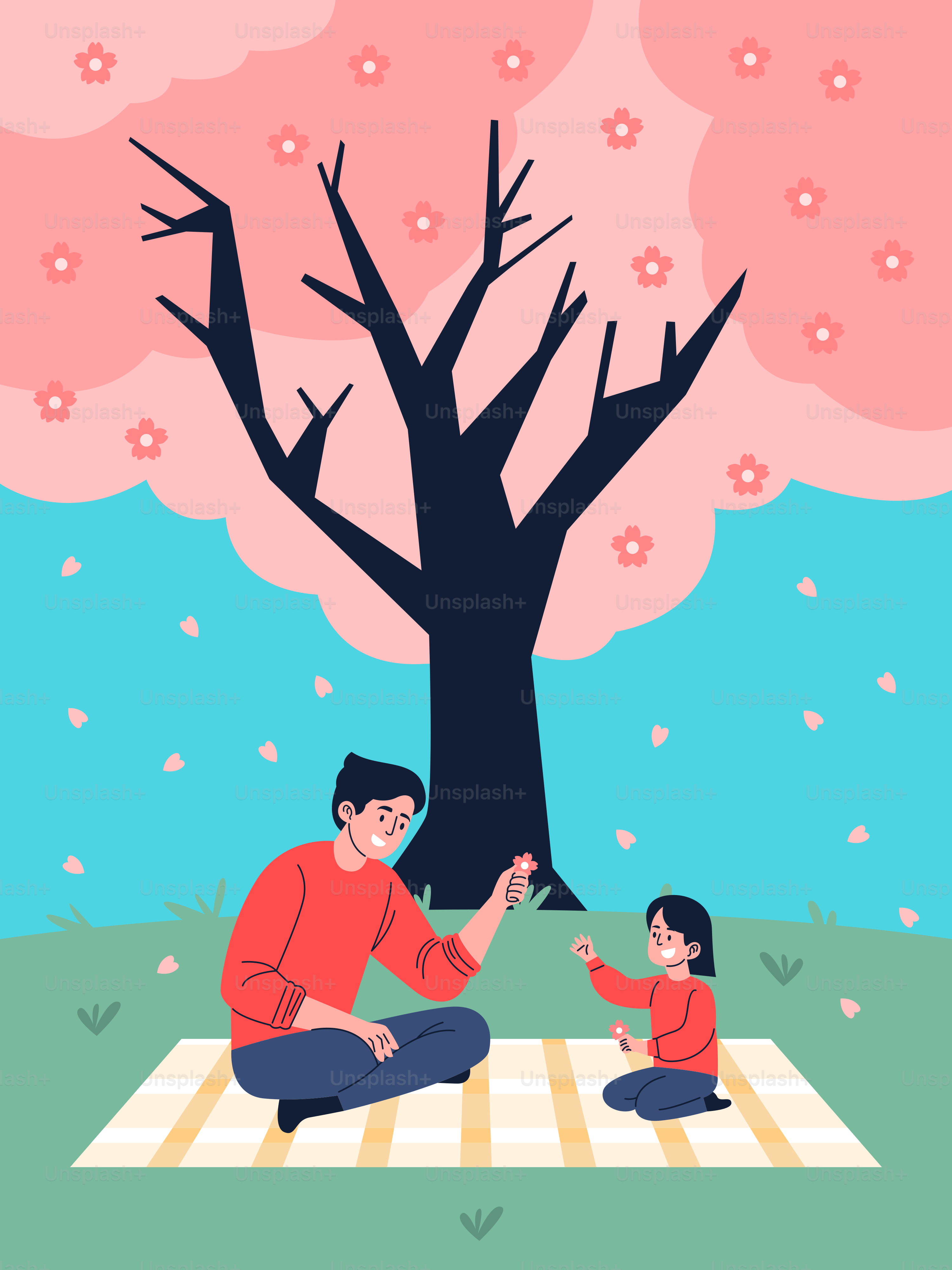 Ein Mann und ein Kind sitzen auf einer Decke unter einem Baum