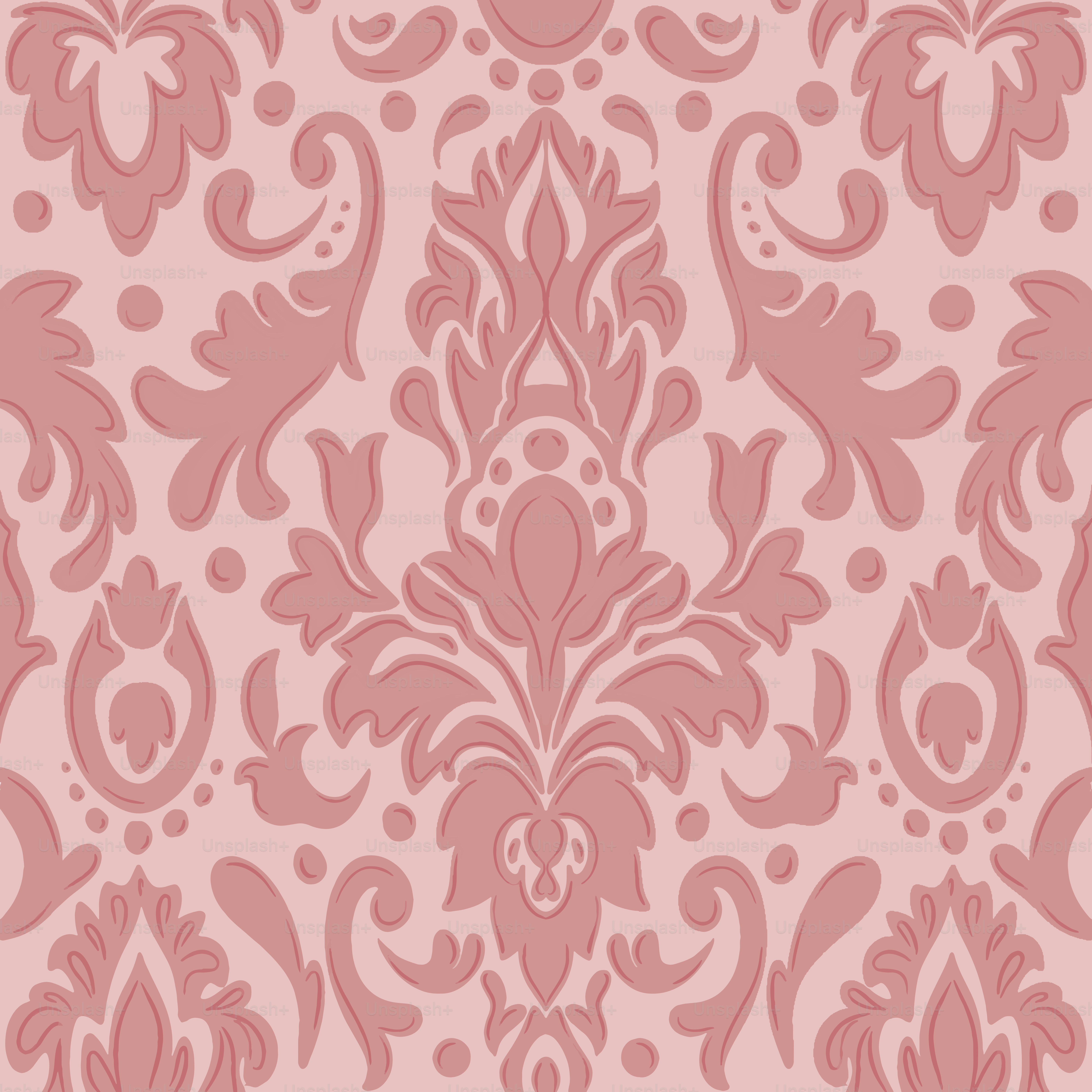 A pink wallpaper with a floral design on it