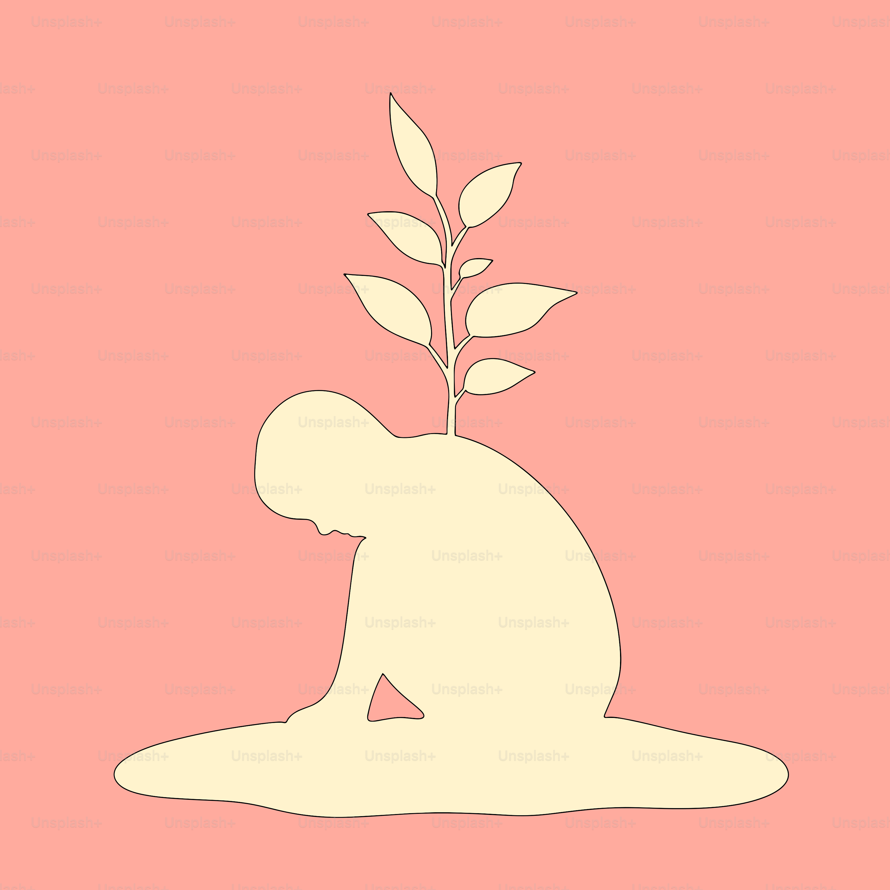 Una persona inginocchiata con una pianta in mano