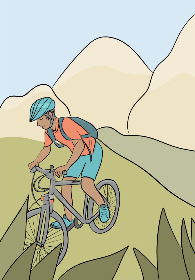 A man riding a bike down a lush green hillside