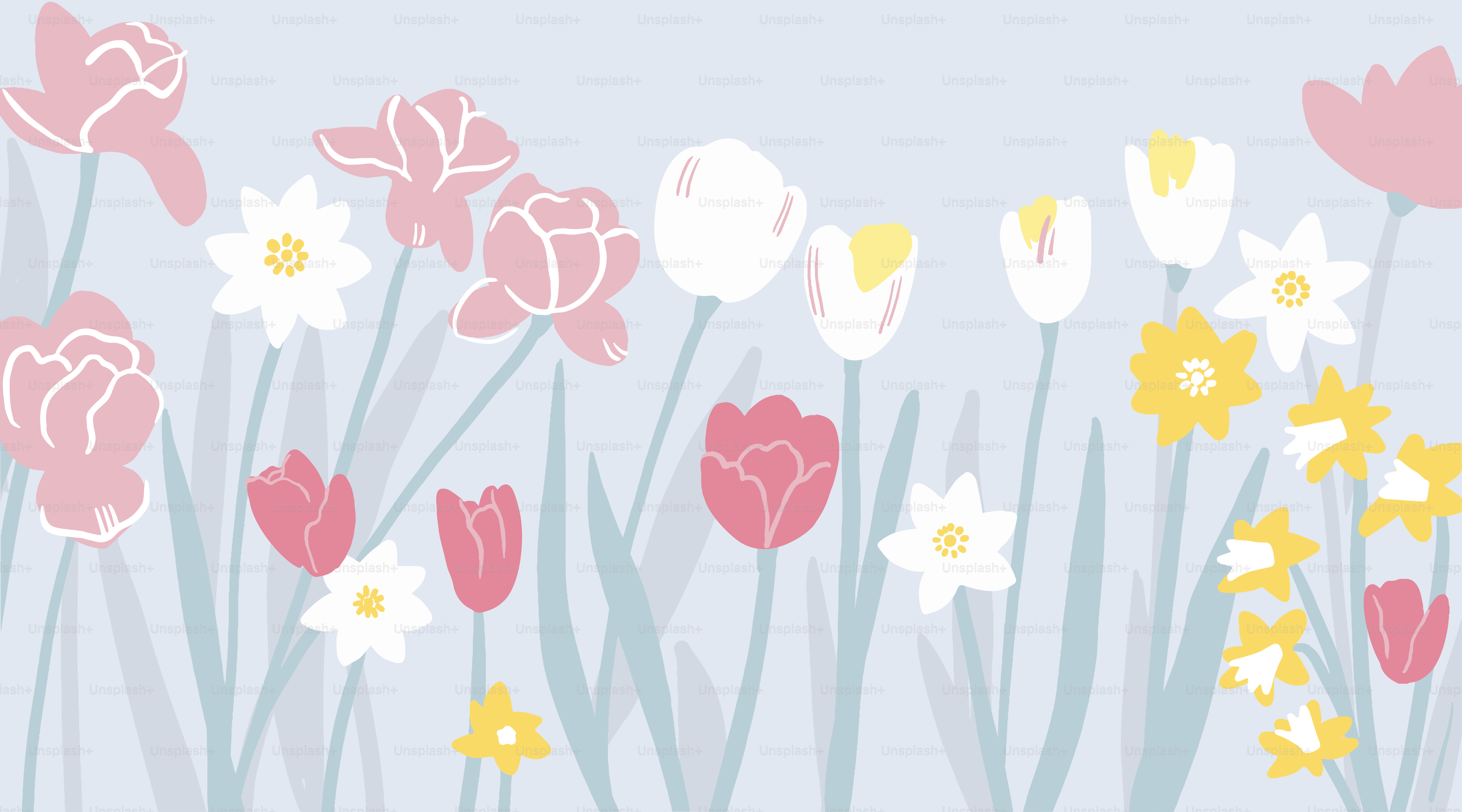 A bunch of flowers that are in the grass