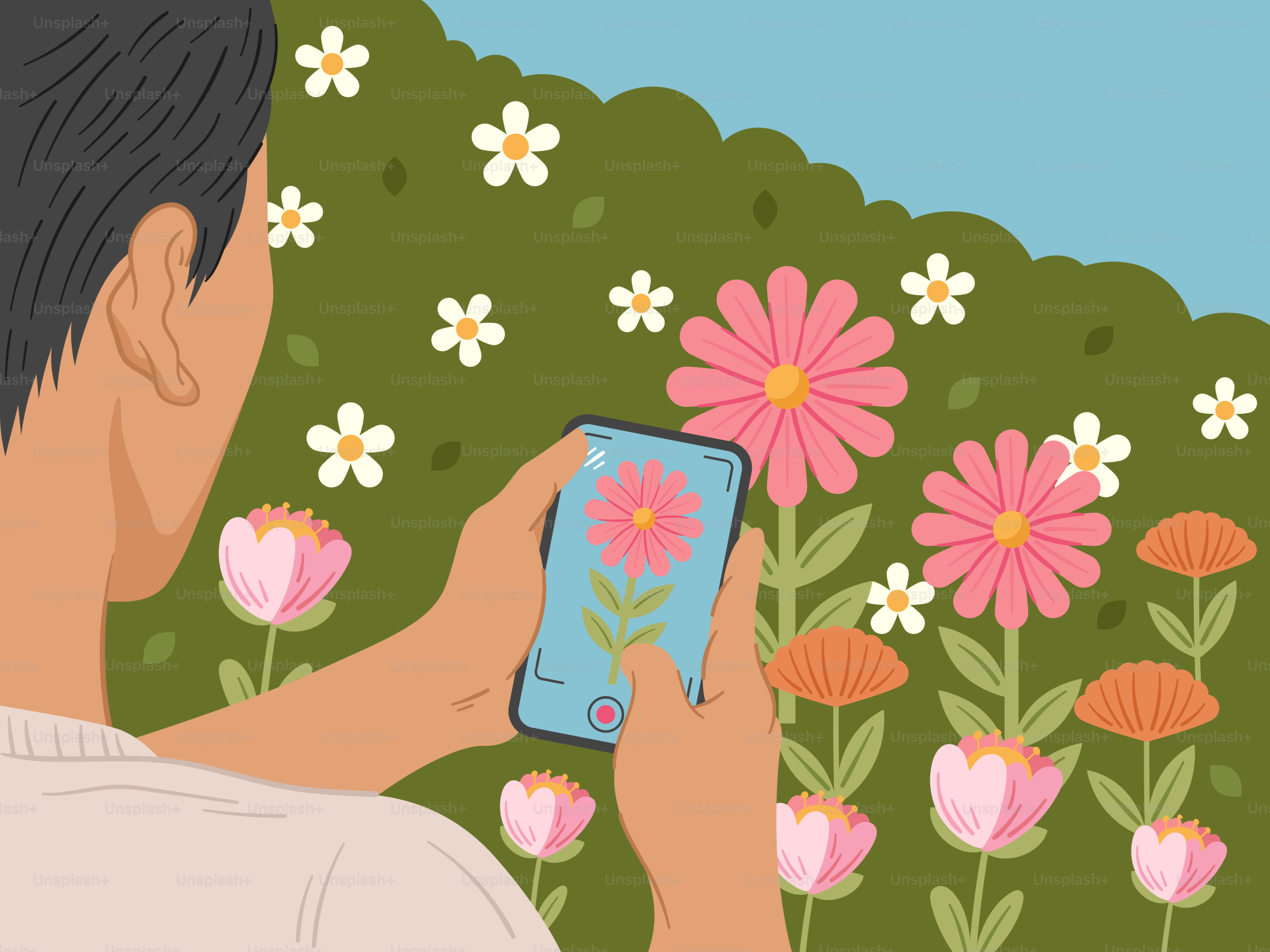 Una persona sosteniendo un móvil delante de un campo de flores