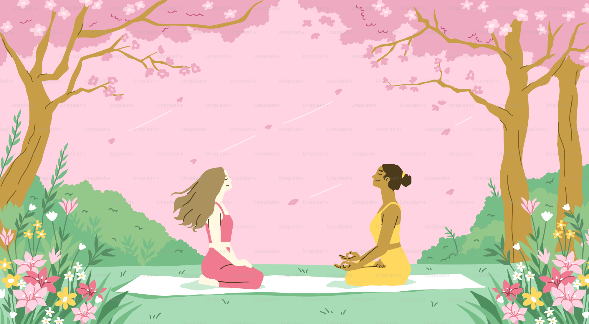 A couple of women sitting on top of a lush green field