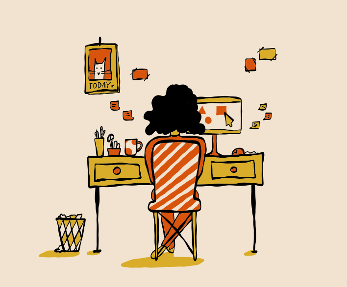 Une personne travaille sur un ordinateur à un bureau.