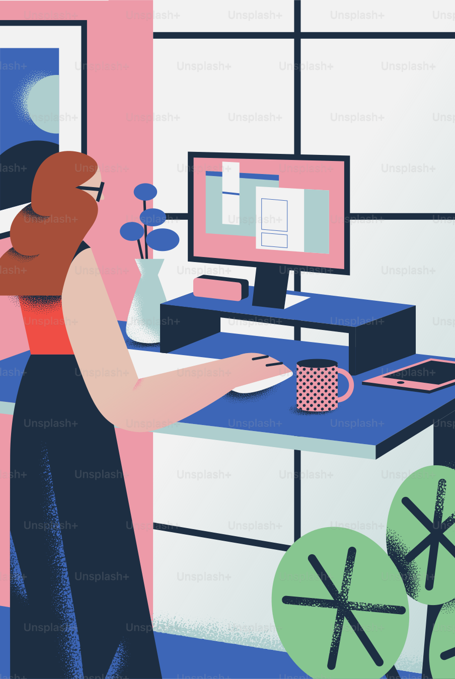 Une femme travaille sur ordinateur dans un espace de travail coloré.