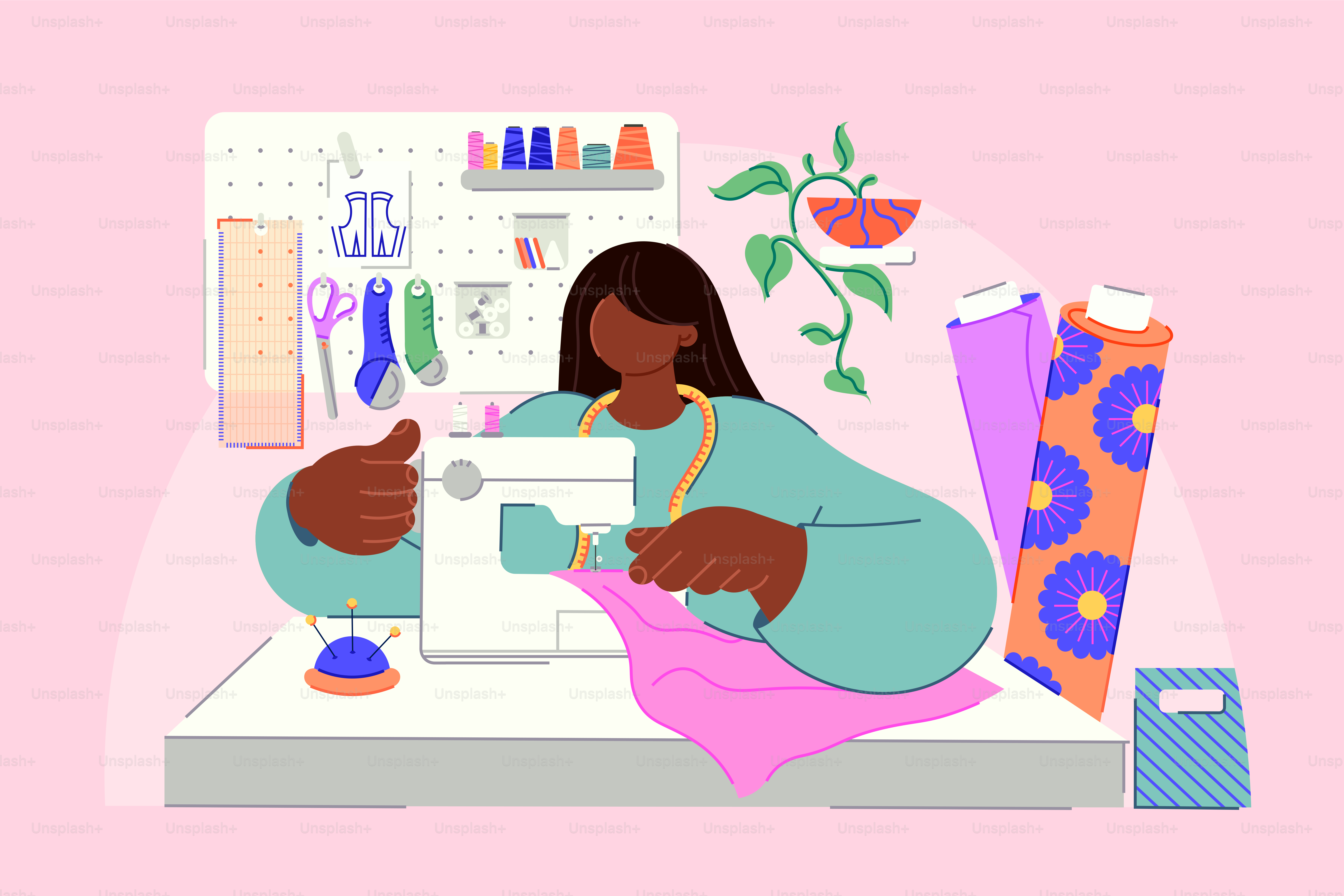 Une femme coud des vêtements à la machine à coudre.