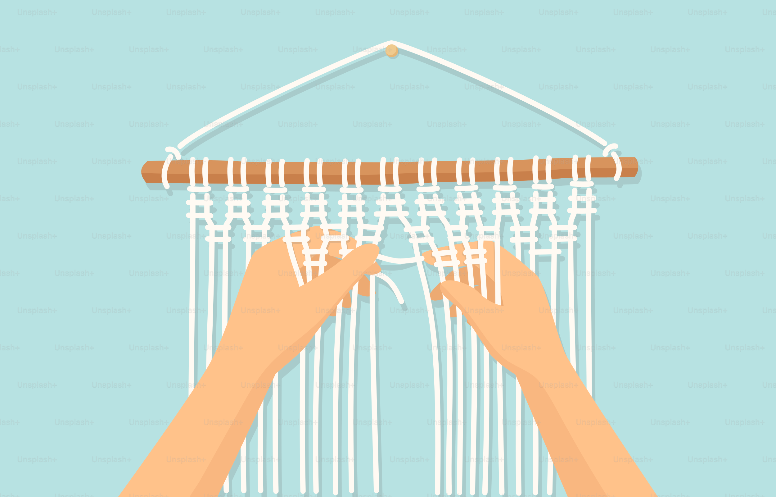 Las manos están haciendo un nudo en el macramé.
