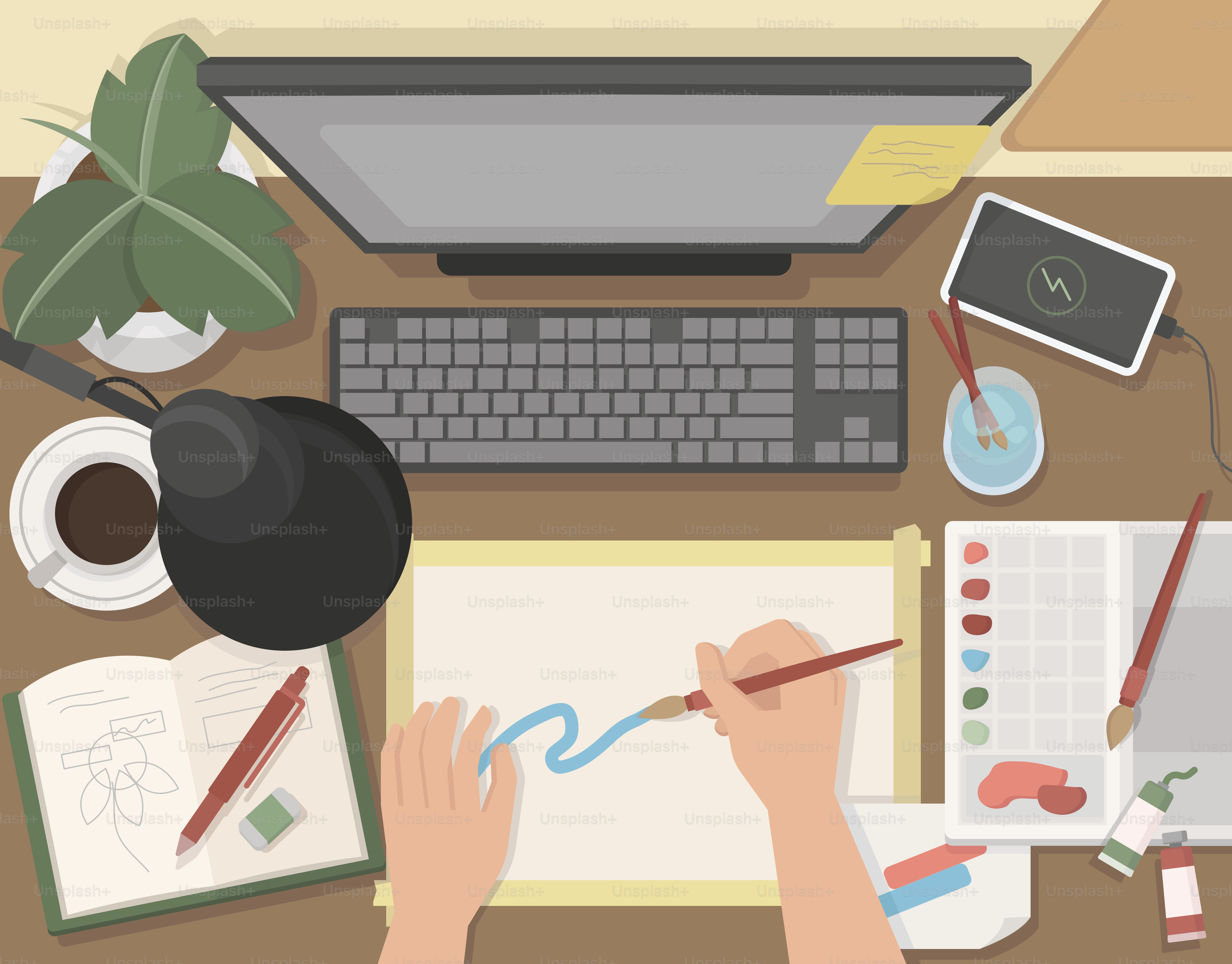 Artist paints on paper at their workspace.