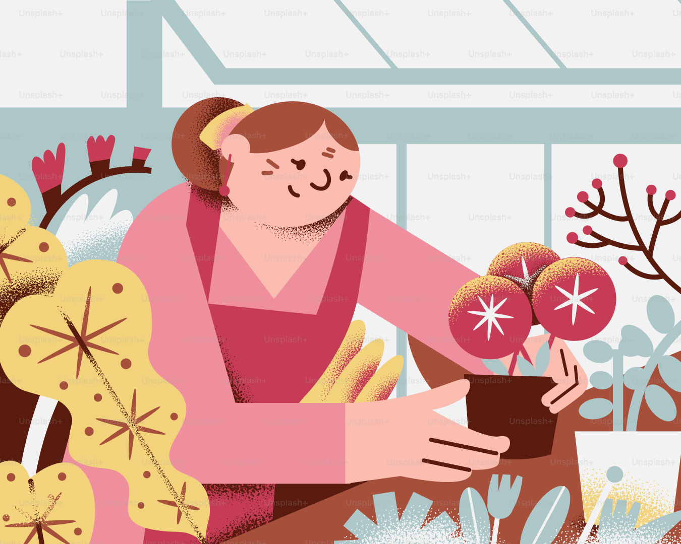 Woman tends to plants in a sunny greenhouse.