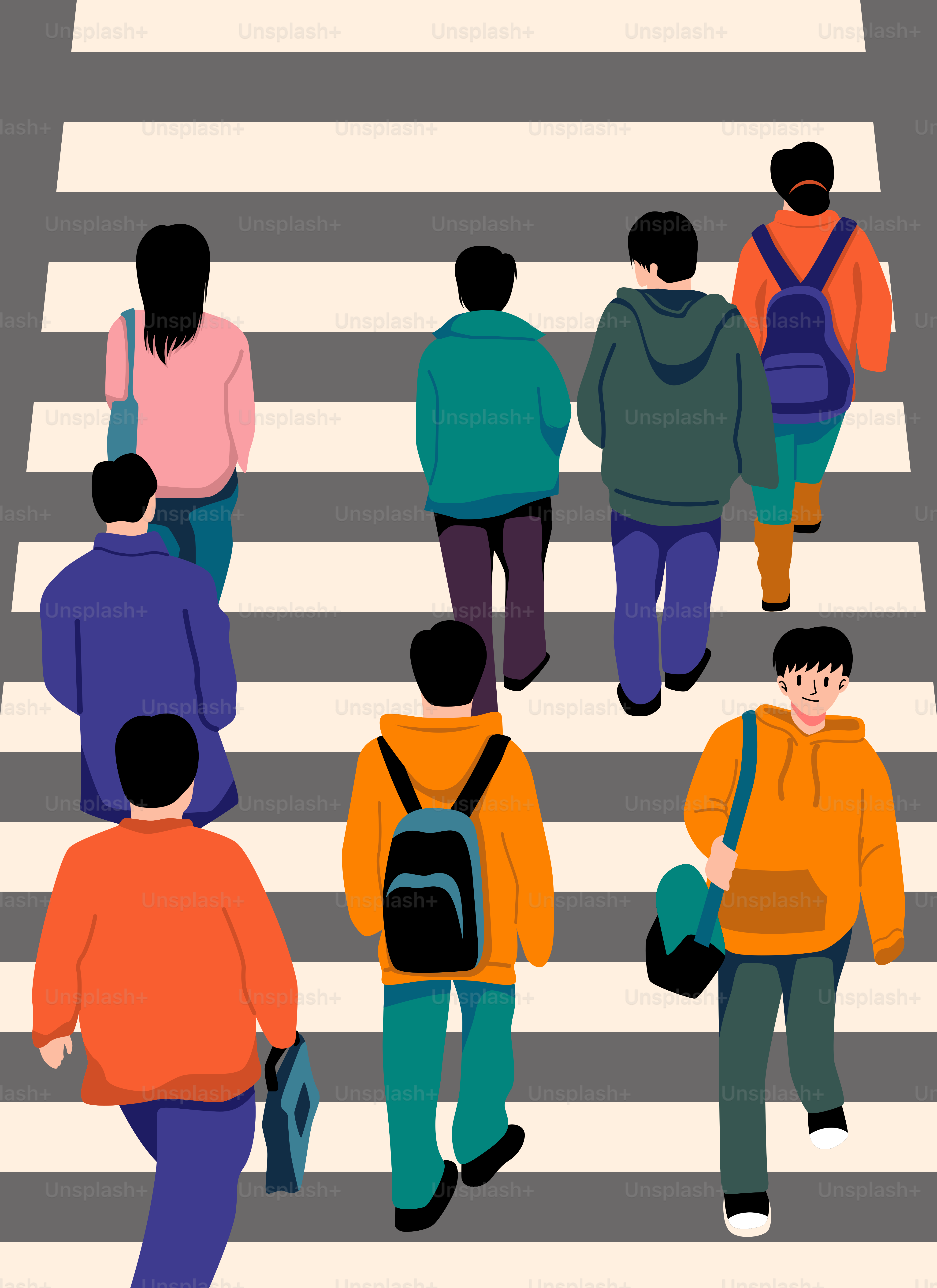 People are walking across a crosswalk together.