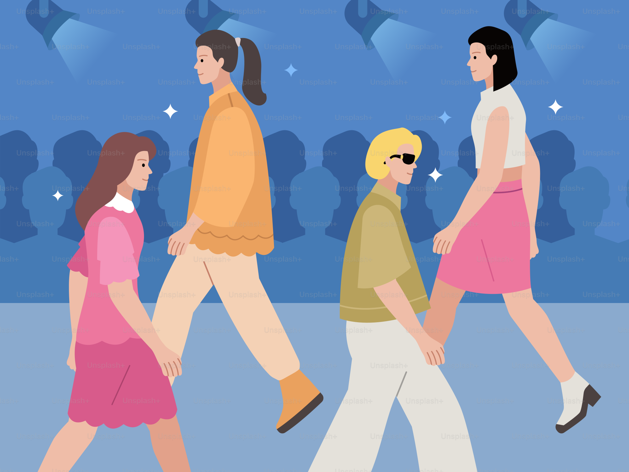 Models walk a runway with a crowd in the background.