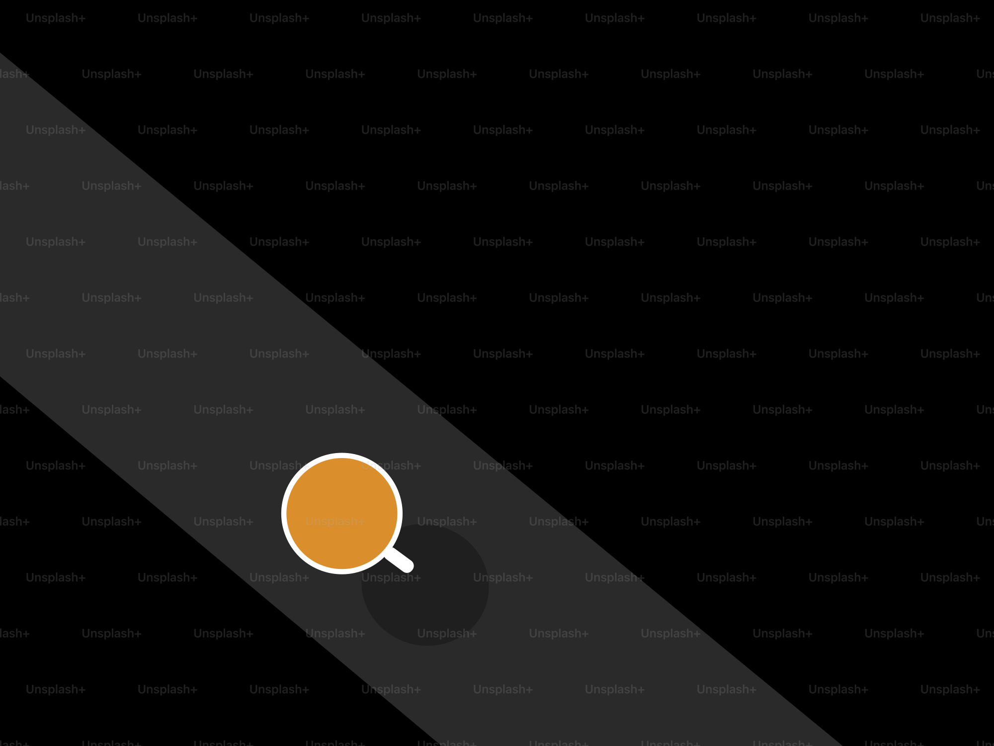 Coffee cup on a dark, angled surface.