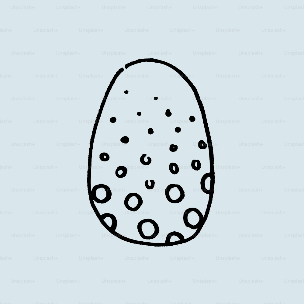 Un œuf pointillé dessiné à l’encre noire.