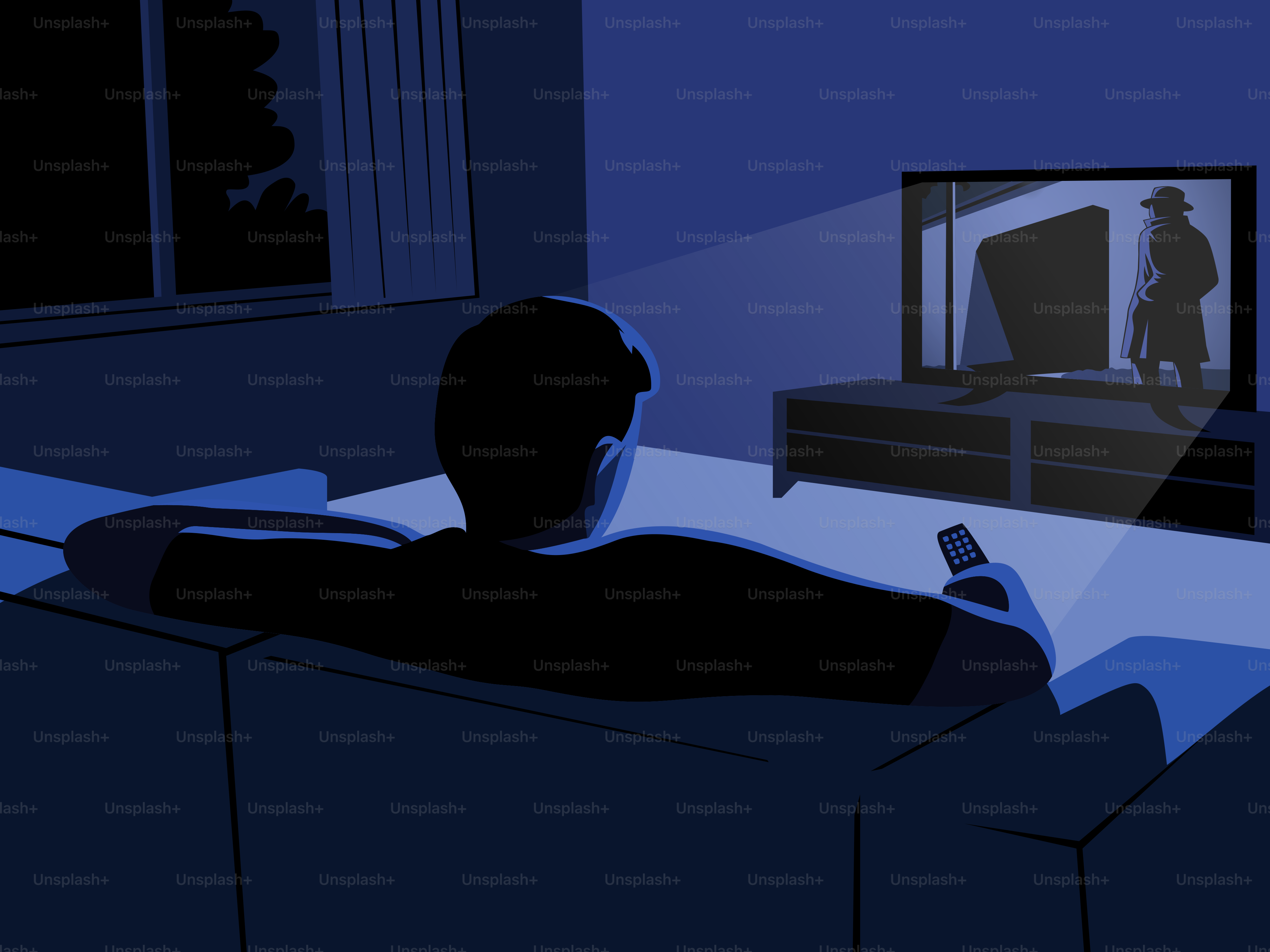 A person watches a movie on television at night.