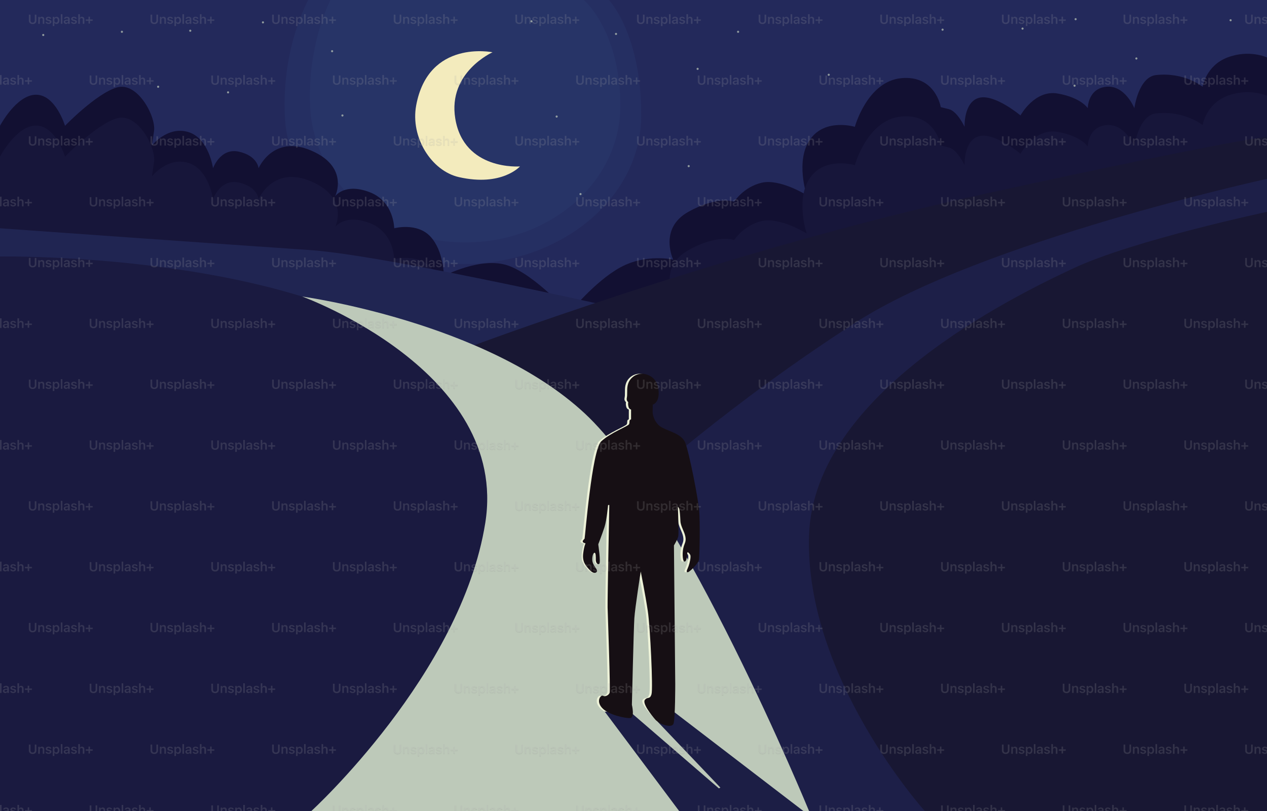 A man faces a fork in the road at night.