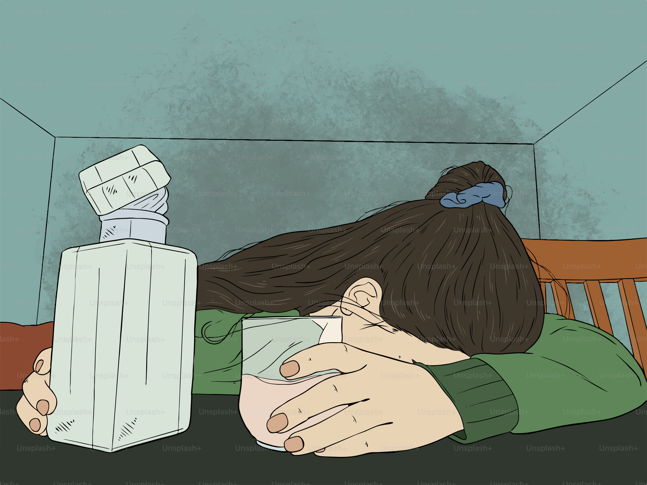 A drunk person lies on a table with a bottle