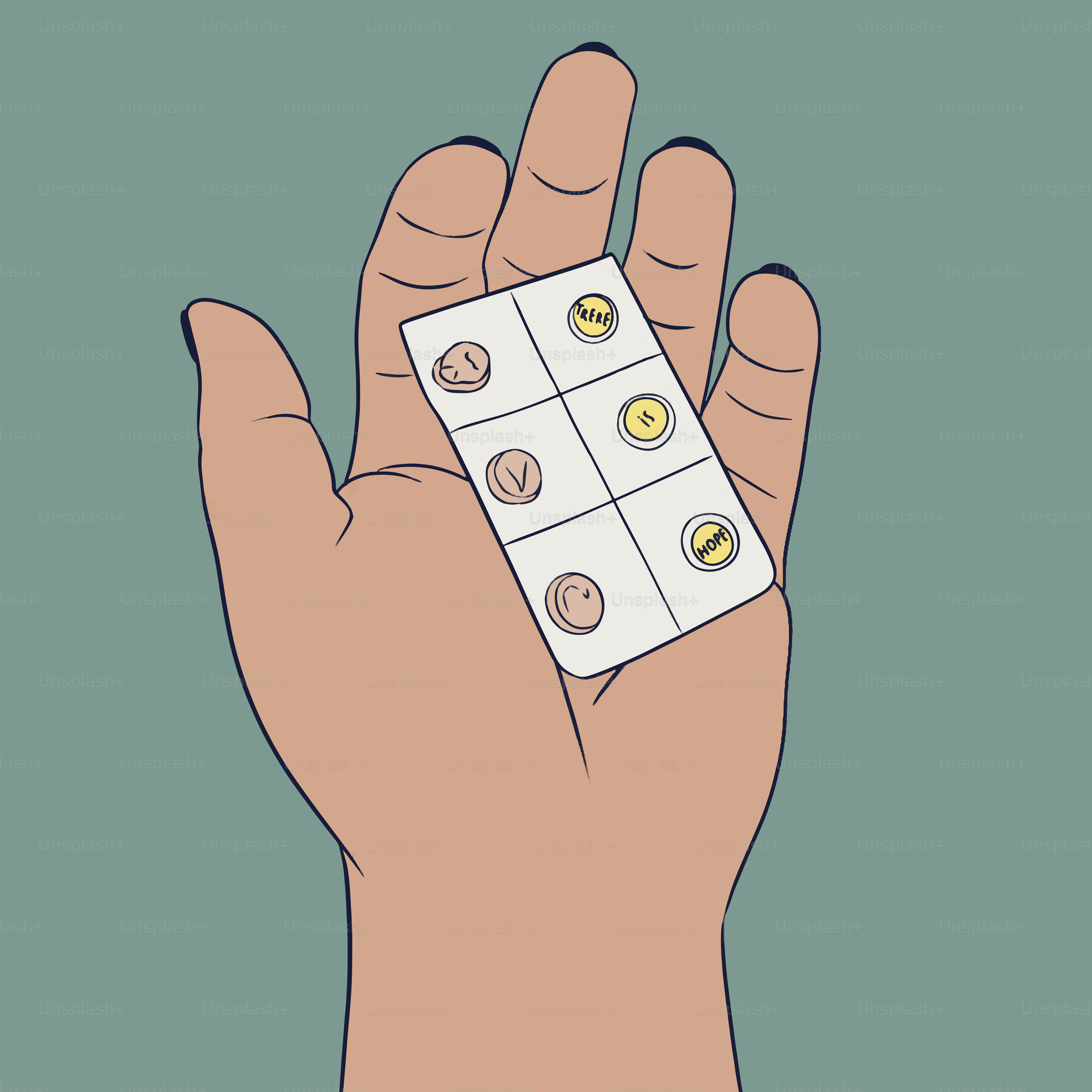 A hand holds a blister pack of pills.