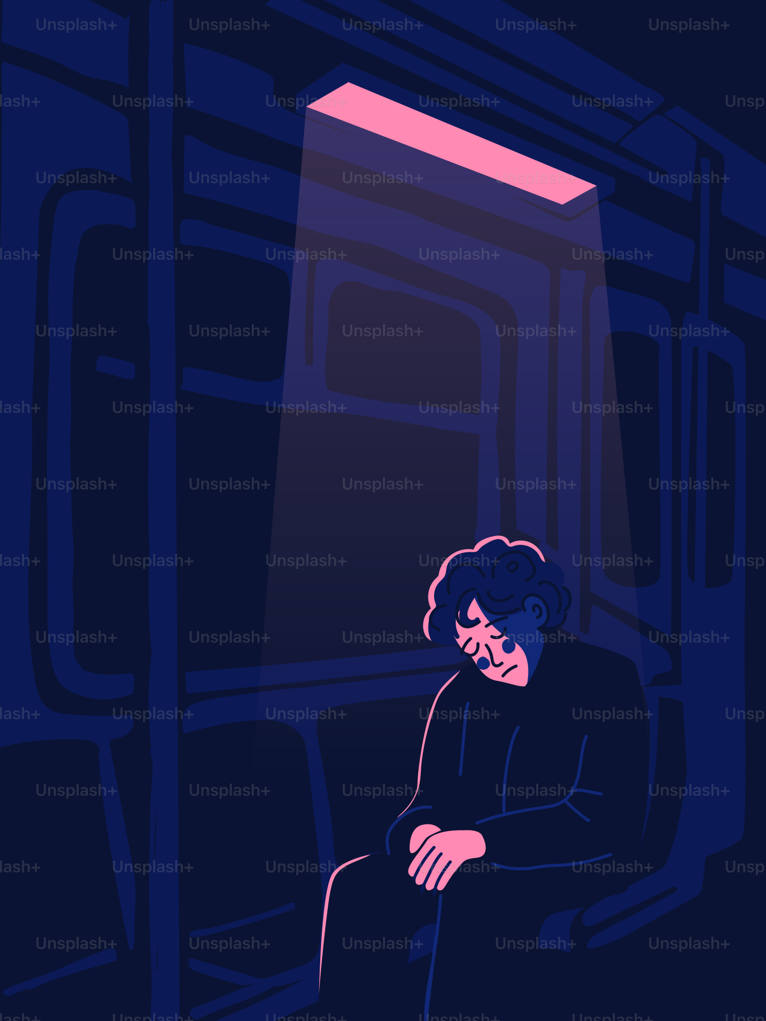 A person sits alone on a late-night subway.